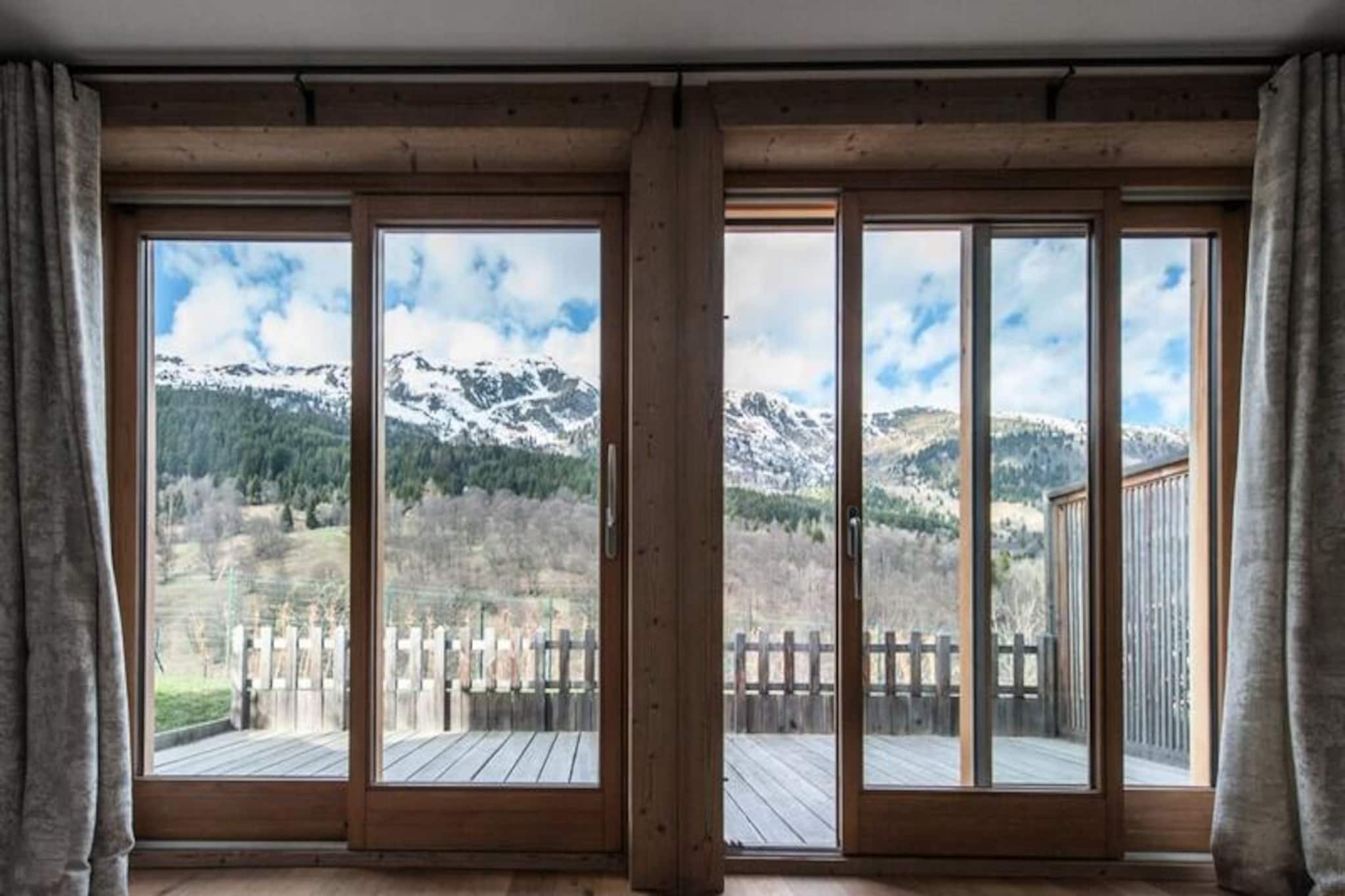 In the heart of the French Alps, where the charm of Méribel meets modern luxury, Chalet Le Bonheur offers an unforgettable retreat for those seeking both adventure and relaxation. This exceptional property, located in the Mussillon district, combines contemporary design with alpine elegance, creating a warm and inviting atmosphere for your mountain getaway. From its spacious interiors to its breathtaking views of the Méribel valley, every detail has been thoughtfully designed to provide a truly luxurious experience. 
 
 Spread across three floors, Chalet Le Bonheur comfortably accommodates 10 to 12 guests in five en suite bedrooms, each featuring its own private bathroom. The centerpiece of the chalet is its grand living and dining area, complete with a striking central fireplace that radiates warmth and character. Plush armchairs, refined decor, and a large terrace overlooking the valley make this space perfect for gathering with family and friends. For ultimate relaxation, the chalet boasts a spa area with a hammam, ideal for unwinding after a day on the slopes. 
 
 Conveniently located at the entrance to Méribel, the chalet is just a short walk from the resort center and its shops, as well as the Chaudanne ski area. A free shuttle bus, stopping only 50 meters from the chalet, ensures easy access to the ski lifts and other attractions in the valley. Nearby, you’ll find the large Spar supermarket and the local dairy cooperative, making it easy to stock up on essentials or indulge in regional specialties. 
 
 Whether you’re here to ski the world-renowned 3 Valleys, explore the alpine trails, or simply relax in the comfort of your private chalet, Le Bonheur promises an unparalleled experience. With additional services such as ski equipment delivery, private chef options, and in-chalet massages available upon request, every moment of your stay can be tailored to perfection.