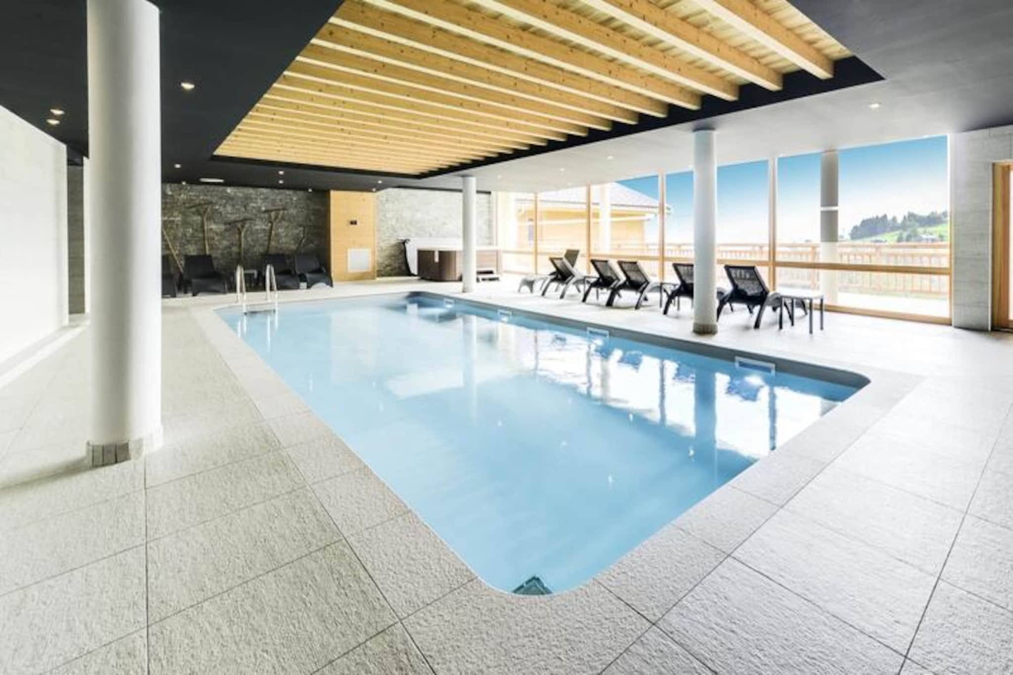 In the picturesque village of Combloux, often referred to as the 'Pearl of Mont Blanc', this luxurious residence offers an unforgettable alpine retreat. Surrounded by the iconic ski areas of Megève, Saint-Gervais, and La Giettaz, the Terresens Les Fermes du Mont-Blanc**** residence is perfectly situated to immerse you in the breathtaking beauty of the Mont Blanc massif. Imagine waking up to panoramic views of snow-capped peaks and stepping into a world where nature and elegance harmoniously blend. 
 
 The residence boasts refined, high-end amenities designed to elevate your stay. Relax in the heated indoor pool, unwind in the sauna or hammam, or enjoy a cozy evening by the fireplace in the relaxation area. Families will appreciate the children’s play area, while ski enthusiasts will find convenience in the dedicated ski lockers. Each apartment is thoughtfully designed, blending luxury with a warm mountain ambiance. Most accommodations feature a private balcony or terrace, offering serene views of the surrounding landscapes. 
 
 Whether you’re seeking adventure or tranquility, Combloux delivers. In winter, explore the snowy wonderland with activities like dog sledding, snowshoeing, or snowmobiling. For those who love skiing, the nearby slopes cater to all levels, ensuring endless fun. Beyond winter, the region transforms into a haven for hiking and mountain biking, with trails that reveal the stunning alpine scenery. 
 
 Choose the Terresens Les Fermes du Mont-Blanc**** residence for a holiday that combines comfort, adventure, and the timeless charm of the French Alps. Let the majestic Mont Blanc be the backdrop to your unforgettable escape.