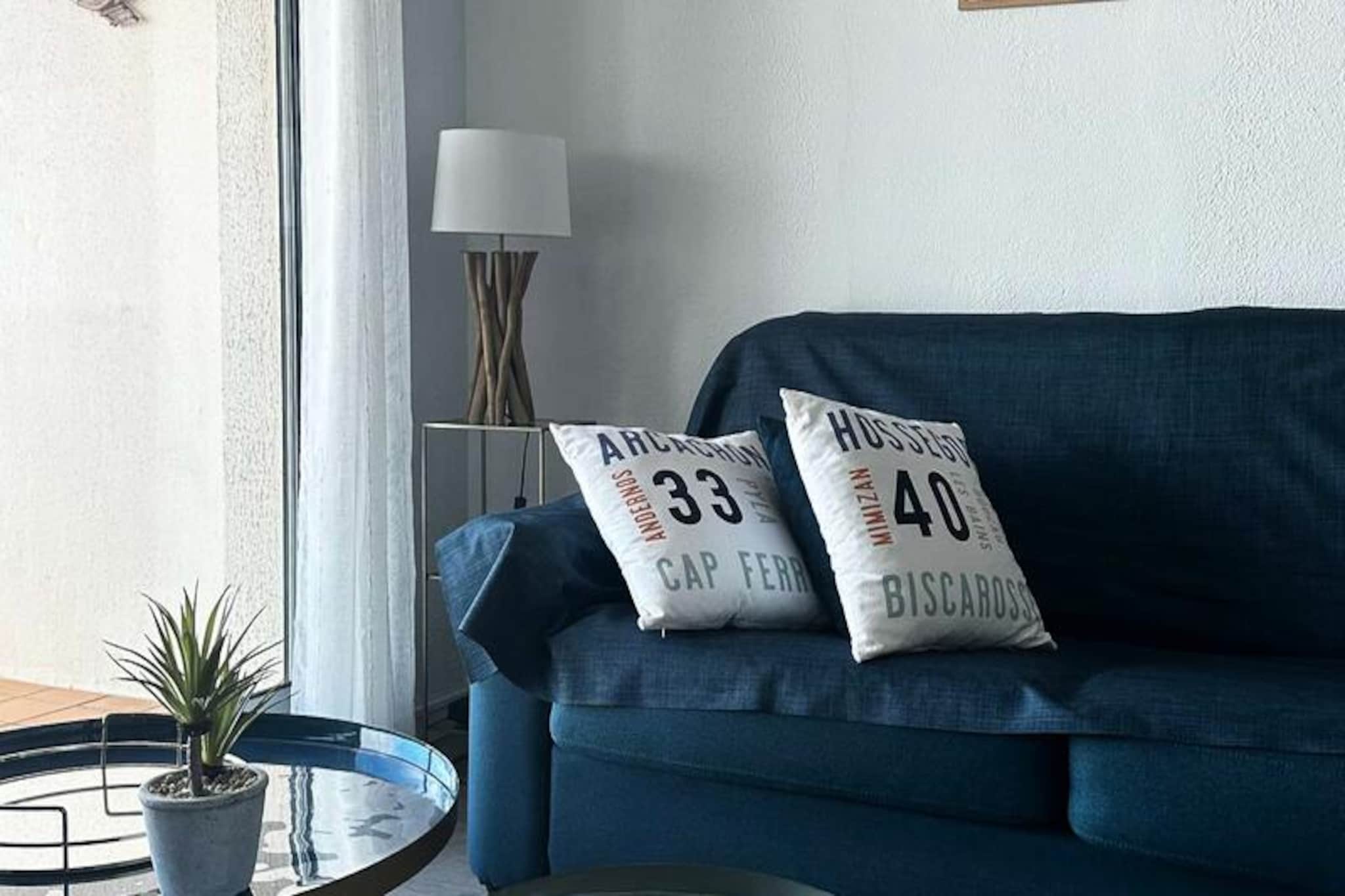 With stunning views of the bay, this charming one-bedroom apartment offers a serene escape for up to four guests. Located on the second floor of a secure residence with elevator access, it combines comfort and convenience just steps away from the beach and marina. Imagine waking up to the gentle sound of waves and enjoying a morning coffee on the balcony while the sea breeze fills the air—a perfect start to your day by the coast. \n\nThe apartment spans 38m² and features a welcoming entrance hall with ample storage space. The bright and spacious living room is equipped with a comfortable 140cm sofa bed, flat-screen TV, Wi-Fi, and a dining table for four. The open-plan kitchen is fully equipped with modern appliances, including a refrigerator/freezer, ceramic hob, microwave/oven, dishwasher, and more, making it easy to prepare meals after a day of exploring. The bedroom offers flexible sleeping arrangements with two 90cm beds that can be joined into a 180cm double bed, along with a wardrobe for your belongings. The bathroom is fitted with a shower cubicle, washbasin, towel warmer, washing machine, and toilet. \n\nStep outside to discover the beauty of the surrounding area. The nearby cycle path runs along the sea, inviting you to take leisurely rides while soaking in the coastal scenery. The apartment’s location is ideal for those seeking both relaxation and adventure, with the beach and marina just a short stroll away. Whether you’re enjoying water sports, dining at seaside restaurants, or exploring local shops, everything you need is within reach. \n\nPerfect for couples or small families, this apartment offers a blend of modern comfort and coastal charm, ensuring a memorable stay by the bay. Book your escape today and experience the tranquility of seaside living.