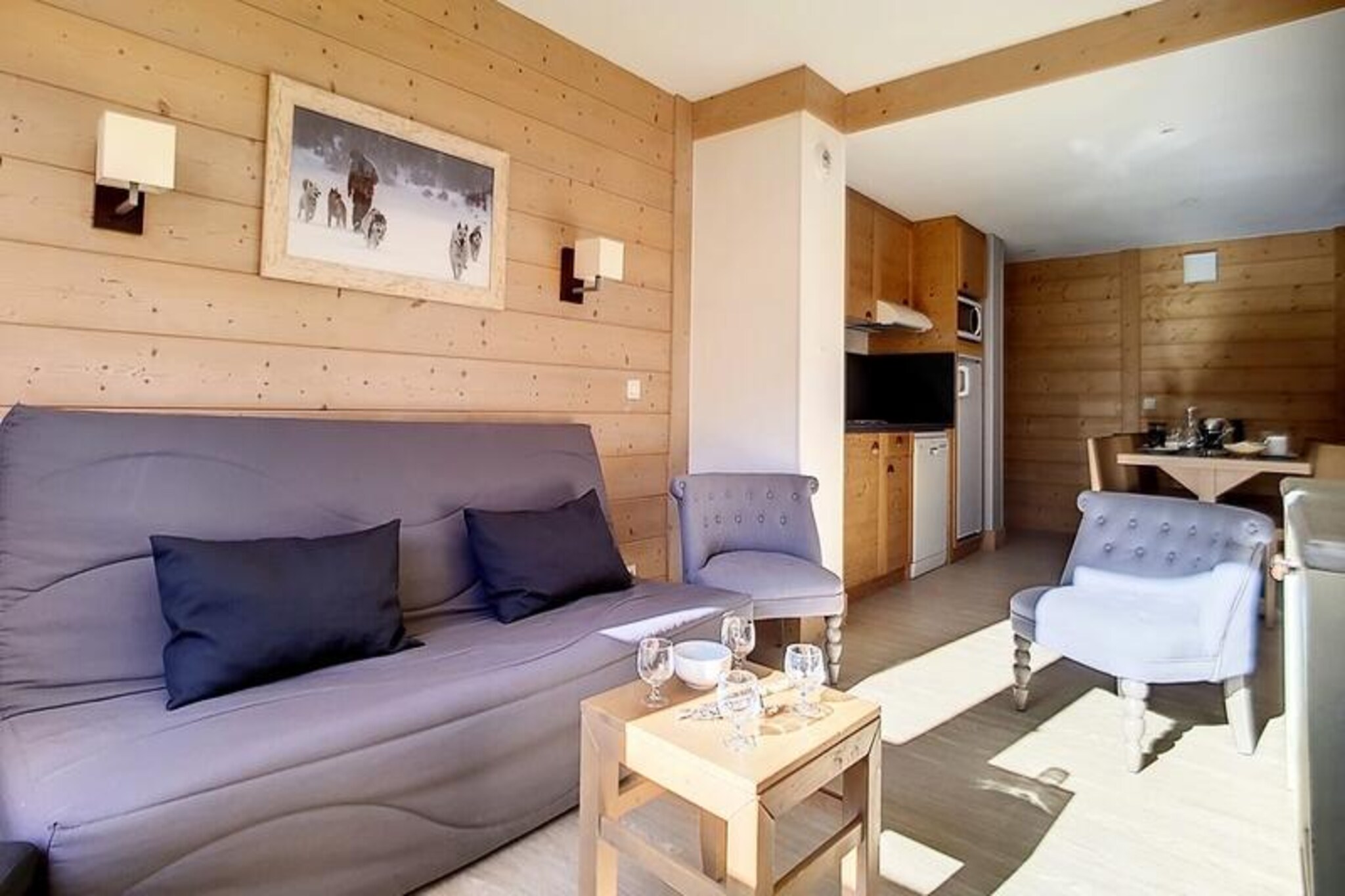In the heart of the vibrant Bruyères district, this beautifully renovated alpine apartment offers a seamless ski-in/ski-out experience, making it a perfect retreat for winter sports enthusiasts and mountain lovers alike. With its southeast-facing orientation, the residence captures the soft morning light, creating a warm and inviting atmosphere to start your day in the French Alps. Whether you're here for the thrill of the slopes or the charm of the surrounding village, this property promises an unforgettable stay. \n\nSpanning 62 m², the apartment comfortably accommodates up to eight guests, making it ideal for families or groups of friends. The living room features a cozy sofa bed with a Bultex mattress, while two bedrooms and a sleeping alcove provide flexible sleeping arrangements with single beds and bunk beds. The fully equipped kitchen, complete with a dishwasher, large refrigerator, and Senseo espresso machine, ensures you can prepare hearty meals after a day of adventure. Modern amenities like a flat-screen television, laminate flooring, and a stylish bathroom with a bathtub and separate shower add to the comfort. A covered parking space with direct access to the residence and a ski locker leading straight to the Fontanettes slope enhance the convenience of your stay.\n\nThe Bruyères district offers everything you need within walking distance. From a ski school and toboggan run to a cinema, restaurants, and a wellness center, the area is buzzing with activity. Families will appreciate the children's playground, while après-ski options abound for those looking to unwind. In summer, the region transforms into a haven for hikers and nature lovers, with breathtaking trails and alpine scenery.\n\nWhether you're seeking an action-packed ski holiday or a tranquil mountain escape, this apartment in the Aconit residence combines modern comfort with unbeatable access to the best of Les Menuires. Create cherished memories in this picturesque alpine setting.
