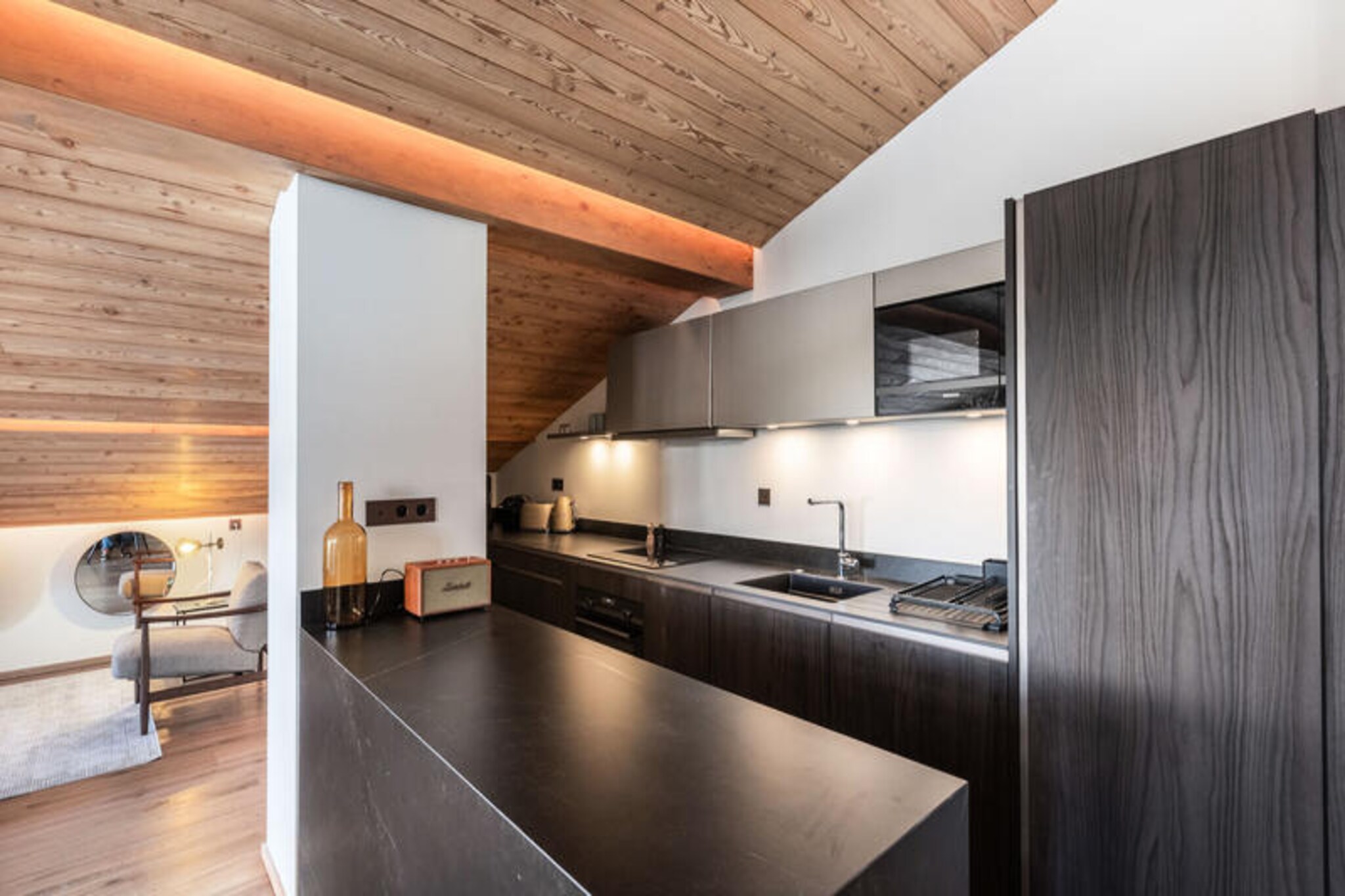 High above the world in the prestigious Courchevel 1850, this luxurious duplex apartment offers an alpine retreat like no other. Imagine waking up to the crisp mountain air and stepping out onto your private balcony to take in the breathtaking views of the snow-dusted peaks. With the ski slopes just steps away from the residence, your day of adventure begins the moment you leave the ski room. This is more than just a property; it’s an invitation to experience the magic of the French Alps in unparalleled comfort and style.
Spanning approximately 186m², the apartment is designed to accommodate up to 8 adults across four elegant bedrooms, each featuring en-suite bathrooms, televisions, and private balconies. The open-plan living area on the upper level is a haven of relaxation, complete with a cozy fireplace, a dining area, and a fully equipped kitchen that invites shared meals and warm conversations. Modern amenities such as a ski room, covered parking, and access to the residence’s spa and swimming pool ensure a seamless and indulgent stay.
Courchevel 1850 is a destination that needs no introduction. Renowned for its world-class skiing, fine dining, and vibrant après-ski scene, it’s the perfect blend of adventure and sophistication. Whether you’re exploring the pristine slopes, indulging in a spa treatment, or simply unwinding by the fire, this property places you at the heart of it all.
Choose this exceptional residence for your next alpine getaway and create memories that will last a lifetime. From the moment you arrive, you’ll understand why Courchevel 1850 is a destination like no other.
