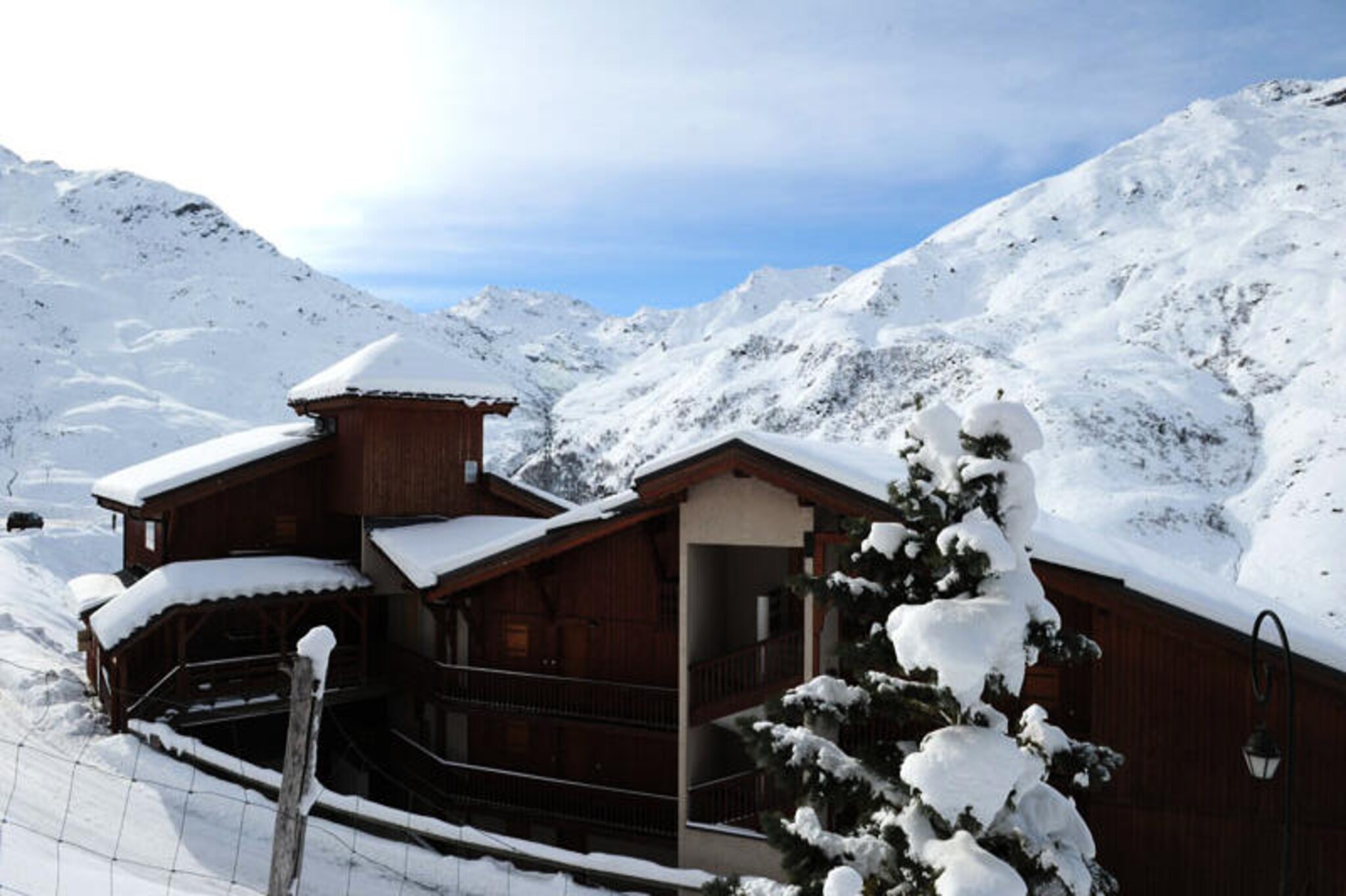 High above the Bruyères district, this elegant duplex apartment offers a serene alpine escape with breathtaking views and direct access to the slopes. Imagine waking up to the sun rising over snow-covered peaks, stepping onto your spacious corner balcony, and breathing in the crisp mountain air before heading out for a day of adventure. Perfectly situated on the 12th floor, this residence combines comfort, convenience, and a touch of luxury for an unforgettable stay in the French Alps. \n\nDesigned to accommodate up to 10 guests, the apartment features a thoughtfully arranged layout with three cozy bedrooms, a bright living area, and a fully-equipped kitchen. Whether you’re preparing a hearty breakfast on the induction hobs or unwinding with a warm drink by the television, every detail has been curated to ensure relaxation. The attic-style children’s room adds charm, while modern amenities like a washing machine, Nespresso machine, and paid Wi-Fi provide all the comforts of home. Two bathrooms, one with a bathtub and the other with a shower, ensure convenience for larger groups. \n\nStep outside and discover the vibrant Bruyères district just 200 meters away. From restaurants and shops to a cinema and wellness center, everything you need is within easy reach. Families will love the toboggan run, ski school, and playground, while thrill-seekers can explore the slopes and lifts right at the residence’s doorstep. In summer, the area transforms into a haven for hiking and outdoor activities amidst stunning alpine scenery. \n\nWhether you’re here for winter sports or summer adventures, this 3-star rated apartment promises a memorable retreat surrounded by the beauty of the Alps. With its unbeatable location and thoughtful amenities, it’s the perfect base for creating cherished holiday memories.
