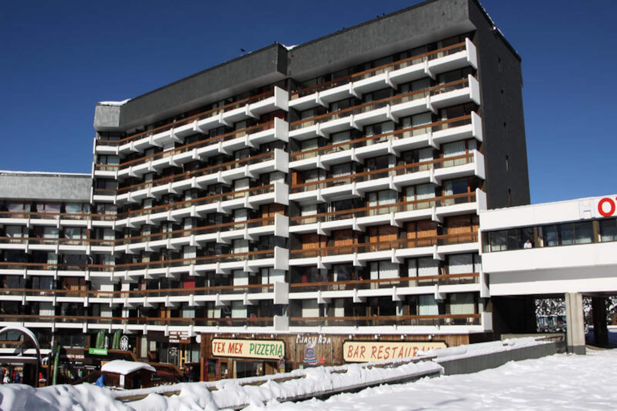 High above the serene La Croisette district, this charming studio apartment offers a cozy alpine retreat with direct access to the slopes. Imagine stepping out of your building and instantly finding yourself amidst the snowy trails, ready for a day of adventure. The Chavière residence also connects directly to a convenient shopping arcade, making it easy to grab essentials or enjoy a leisurely stroll after a day on the mountain. With free outdoor parking at the foot of the building (subject to availability), your arrival and departure are as seamless as your stay.
Located on the 5th floor with elevator access, this 24m² studio is thoughtfully designed to accommodate up to 4 guests. The living area features two single bunk beds, a single sofa bed, and a pull-out bed, offering flexible sleeping arrangements for families or small groups. A south-facing balcony provides stunning slope views, perfect for soaking in the alpine atmosphere. The apartment is equipped with a television, DVD player, and a compact yet functional kitchen that includes a two-burner cooktop, refrigerator, mini-oven, mini-dishwasher, toaster, kettle, and coffee maker. Linoleum flooring throughout ensures a clean and practical space, while blankets and duvets add a touch of warmth and comfort.
Beyond the apartment, the La Croisette district offers a family-friendly ambiance with a daycare center just 300 meters away. Whether you're here for skiing, snowboarding, or simply to relax, the location ensures you're never far from the action. Paid Wi-Fi access (subject to network coverage) keeps you connected, while the non-smoking policy guarantees a fresh and pleasant environment. Please note, the bunk beds are not suitable for children under 6 years old.
For those seeking a convenient and cozy base in the heart of the French Alps, this studio apartment in the Chavière residence is an ideal choice. With its unbeatable location, thoughtful amenities, and breathtaking views, it promises a memorable mountain getaway.