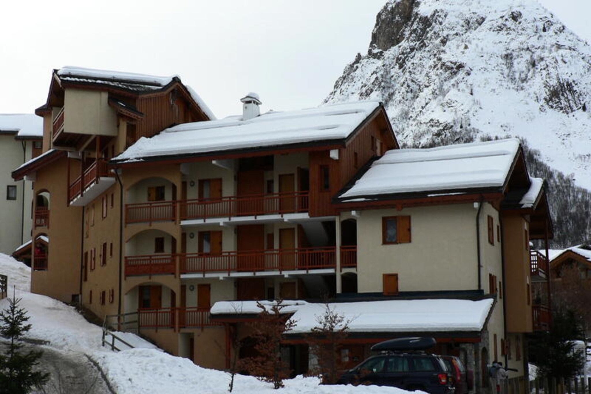 In the picturesque Grangeraies district, where alpine charm meets modern convenience, this inviting apartment offers a cozy retreat for your mountain adventures. With the Saint Martin 1 gondola lift just steps away, you’ll have direct access to the renowned 3 Valleys ski area, making it an ideal base for exploring one of the largest ski domains in the world. The south/west-facing balcony provides a serene spot to soak in the breathtaking views and golden sunsets over the snowy peaks, creating an atmosphere of tranquility and inspiration. \n\nThis 47 m² apartment comfortably accommodates up to six guests across its thoughtfully designed layout. The master bedroom features a plush double bed, while the second bedroom offers two single bunk beds, perfect for families or groups of friends. The living room includes a double sofa bed, satellite TV, and a warm, welcoming space to unwind after a day on the slopes. The well-equipped kitchen boasts modern appliances such as a mini-oven, refrigerator, dishwasher, and microwave, ensuring you can prepare hearty meals with ease. A separate bathroom with a bathtub and a separate WC add to the convenience and comfort of your stay. \n\nLocated just a 10-minute walk from the village center, you’ll find grocery stores, sports equipment shops, and ski schools within easy reach. Whether you’re seeking thrilling descents, peaceful walks through snow-covered trails, or a taste of local Savoyard cuisine, this location places you at the heart of it all. In winter, enjoy the added comfort of included linens, towels, and ski locker access for stays of seven nights or more. \n\nChoose this charming apartment for a memorable alpine escape, where every detail is designed to enhance your experience. From its prime location to its cozy interiors, it’s the perfect haven for creating unforgettable moments in the French Alps.