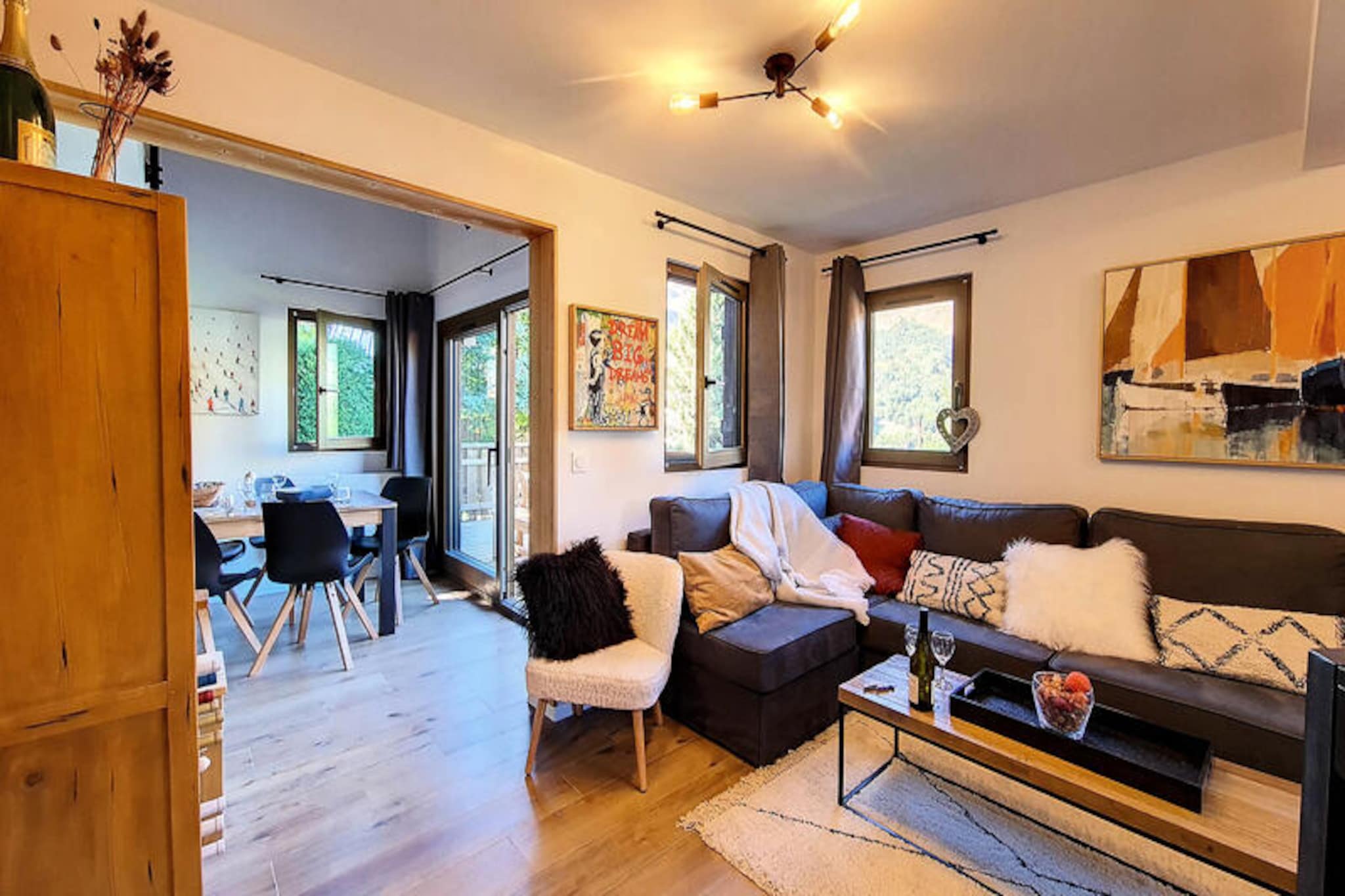 Amidst the serene charm of Villarencel in Saint-Martin de Belleville, Chalet Mabé offers a tranquil retreat surrounded by breathtaking alpine beauty. Just a short five-minute stroll from the village center and ski lift, this chalet combines convenience with a peaceful, wooded setting that invites relaxation. From the south-west-facing terrace, soak in the exceptional views of the Encombres valley and the majestic Cochet peak, creating an unforgettable backdrop for your holiday. Whether you're here to ski the renowned slopes or simply unwind in nature, this chalet is your gateway to the wonders of the French Alps. \n\nSpanning 87 square meters, Chalet Mabé comfortably accommodates up to six guests in its thoughtfully designed spaces. The ground floor features a cozy living room with a wood-burning stove, television, and DVD player, perfect for evenings spent indoors. The fully equipped kitchen includes modern appliances such as induction hobs, oven, refrigerator, freezer, microwave, and a Nespresso coffee machine, ensuring you have everything needed for home-cooked meals. Each of the three en-suite bedrooms offers privacy and comfort, with amenities like walk-in showers, towel warmers, and ample storage. Additional features include a boot dryer, ski locker, and WiFi access, making your stay as seamless as possible. \n\nSaint-Martin de Belleville is a gem of the Three Valleys ski domain, offering world-class skiing and a charming village atmosphere. Beyond the slopes, explore the local shops, restaurants, and cultural landmarks, or venture into the surrounding trails for hiking and snowshoeing. The chalet's Gold Snowflake Quality Label guarantees a high standard of comfort and elegance, making it the perfect choice for families, couples, or friends seeking a memorable alpine escape. Let Chalet Mabé be your sanctuary in the mountains, where every moment is infused with the magic of the French Alps.