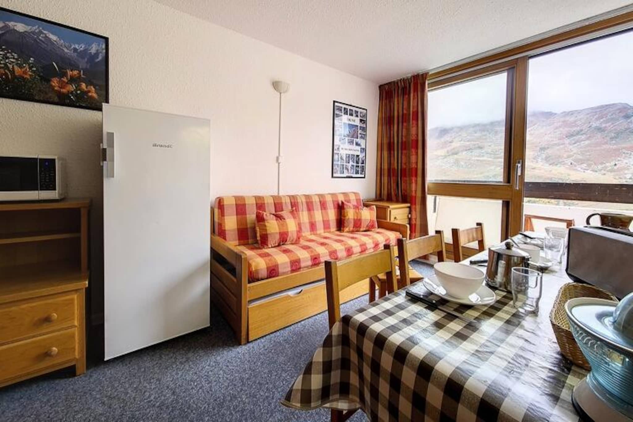 Comfortable triplex apartment · Ski-in/ski-out access · Balcony