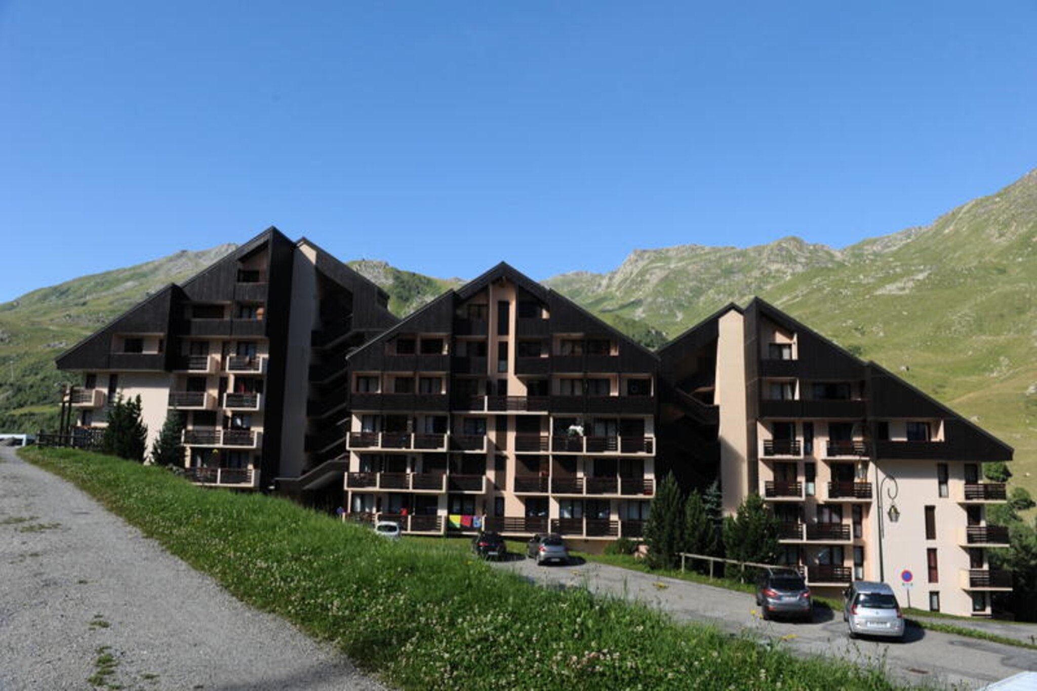 Where the pristine slopes of Les Menuires meet the charm of alpine living, this cozy studio apartment offers a perfect retreat for ski enthusiasts and nature lovers alike. Situated in the Sarvan residence in the Preyerand district, the property boasts direct ski-in/ski-out access from its west-facing balcony, allowing you to step straight onto the snow and embrace the magic of the mountains. With the free Preyerand cable car operating daily until late evening, reaching the central La Croisette area is effortless, ensuring you’re always connected to the heart of the action. \n\nInside, the 25 m² studio is thoughtfully designed to accommodate up to four guests. The living area features a comfortable sofa bed for two, while a separated sleeping alcove with bunk beds offers additional privacy. The apartment is equipped with modern amenities, including a television, a fully-equipped kitchen with a mini oven, dishwasher, coffee maker, and toaster, as well as a bathroom with a bathtub and separate toilet. Ski lockers with coded access provide convenience, and the apartment is non-smoking for a fresh and welcoming environment. \n\nBeyond the slopes, Les Menuires offers a vibrant mix of après-ski activities, dining options, and local shops, all within walking distance. Whether you’re exploring the vast Three Valleys ski domain or enjoying a peaceful evening on your balcony, the breathtaking alpine views and crisp mountain air promise an unforgettable stay. \n\nChoose this charming studio for its unbeatable location, cozy ambiance, and seamless access to one of the world’s most renowned ski destinations. Perfect for couples or small families seeking a blend of adventure and relaxation in the French Alps.