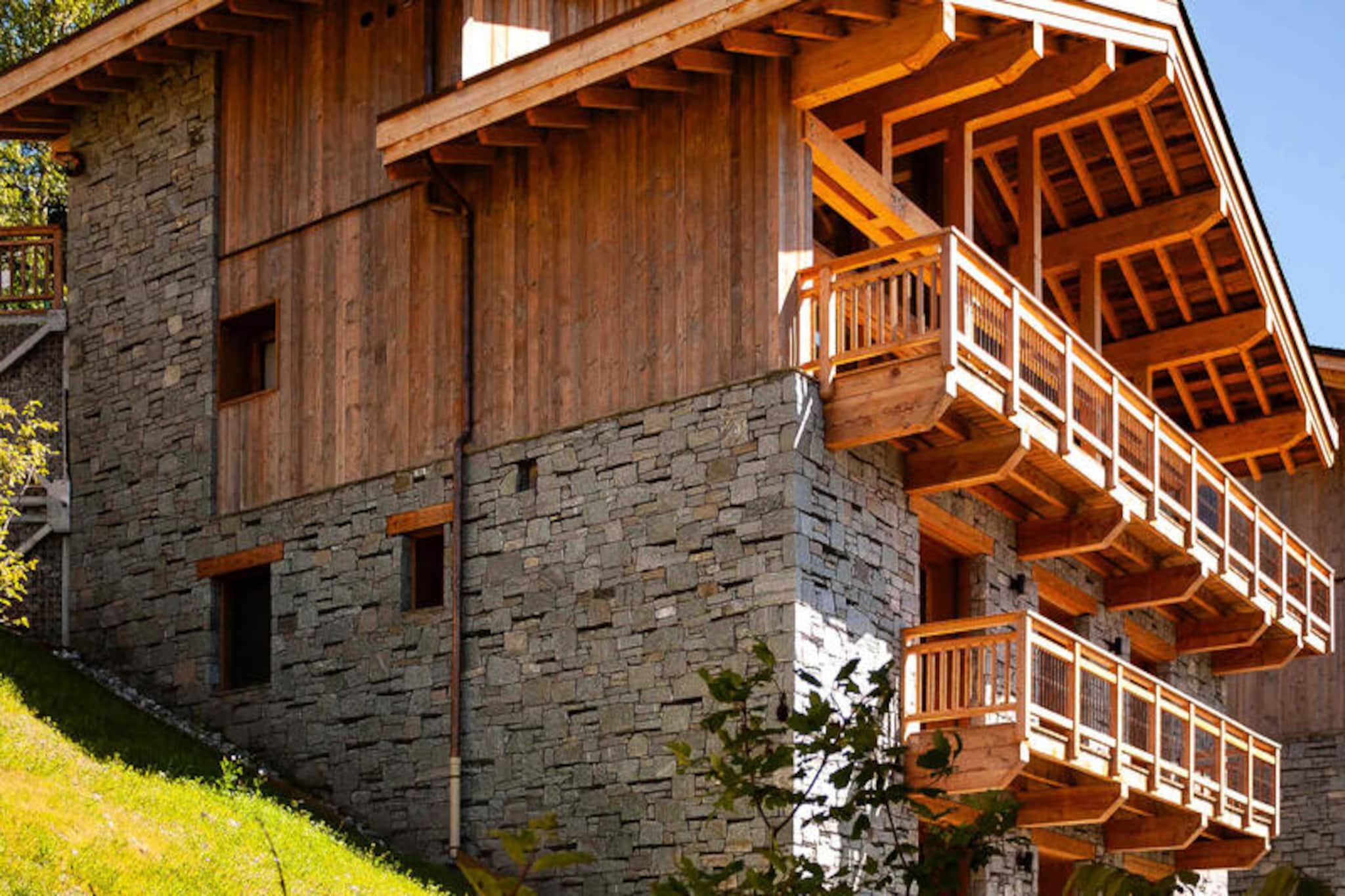 Amid the serene charm of Saint-Martin-de-Belleville, Chalet Noor offers a luxurious alpine retreat where tradition meets modern comfort. This prestigious chalet, nestled in the picturesque hamlet of Caseblanche, is just 100 meters from the slopes, making it a haven for ski enthusiasts and nature lovers alike. The surrounding snow-capped peaks and tranquil village ambiance create the perfect setting for an unforgettable mountain escape. Whether you’re seeking adventure or relaxation, Chalet Noor invites you to experience the magic of the French Alps. \n\nSpanning approximately 200m², this elegant chalet accommodates up to 12 guests, making it ideal for families or groups of friends. Its thoughtful design includes spacious living areas, cozy bedrooms, and a fully equipped kitchen, ensuring every comfort is at your fingertips. The chalet’s warm interiors blend rustic charm with contemporary touches, offering a welcoming atmosphere after a day on the slopes. Additional amenities such as a private garage and efficient heating system enhance your stay, providing convenience and ease throughout your holiday. \n\nLocated near the heart of Saint-Martin-de-Belleville, Chalet Noor is steps away from local shops, restaurants, and essential services. The village’s authentic Savoyard character and vibrant community add to its appeal, while the nearby slopes of Les Trois Vallées promise world-class skiing and breathtaking panoramas. In summer, the region transforms into a paradise for hikers and cyclists, with trails that wind through verdant landscapes and alpine meadows. \n\nChoose Chalet Noor for your next getaway and immerse yourself in the captivating beauty of the French Alps. Whether you’re carving through pristine snow or savoring a quiet evening by the fire, this chalet promises memories that will last a lifetime.
