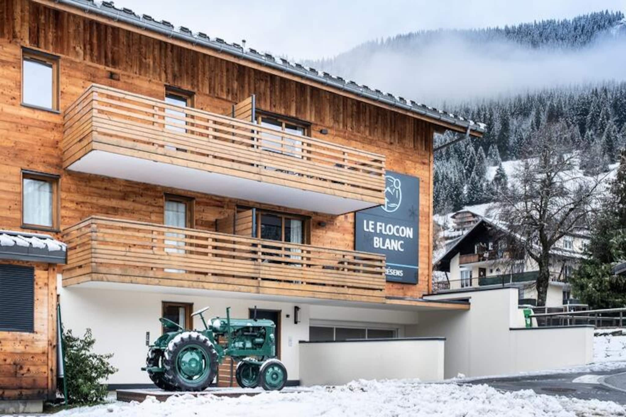 In the picturesque village of La Chapelle d’Abondance, where the charm of Savoyard traditions meets breathtaking alpine vistas, the Terresens Le Flocon Blanc residence offers an idyllic retreat for nature lovers and adventure seekers alike. Imagine waking up to unobstructed views of the serene Abondance Valley, surrounded by snow-capped peaks and the tranquil beauty of the French Alps. Whether you’re here for winter sports or summer hikes, this residence is the perfect base for unforgettable mountain escapes. \n\nEach apartment in this newly built residence is thoughtfully designed with spacious interiors, modern amenities, and tasteful decor that blends contemporary comfort with alpine warmth. From the cozy living room with a sofa bed to the fully equipped kitchen, every detail ensures a relaxing stay. The sleeping arrangements are ideal for families or groups, featuring a double bedroom with an en-suite shower, a sleeping cabin with bunk beds, and a balcony or terrace to soak in the views. High-speed WiFi keeps you connected, while optional extras like baby kits and pet-friendly accommodations cater to your specific needs. \n\nStep outside and ski directly to the Crêt-Béni chairlift, granting you access to the expansive Portes du Soleil ski area. Beyond skiing, the village offers a variety of activities, including dog sledding, snowshoeing, and cross-country trails, ensuring every guest finds their own adventure. In summer, explore lush hiking paths, mountain biking trails, and the vibrant alpine flora. \n\nWith its prime location, thoughtful amenities, and the allure of the Abondance Valley, Terresens Le Flocon Blanc invites you to create lasting memories in the heart of the Alps. Whether you seek thrilling outdoor pursuits or peaceful moments surrounded by nature, this residence is your gateway to an extraordinary alpine experience.