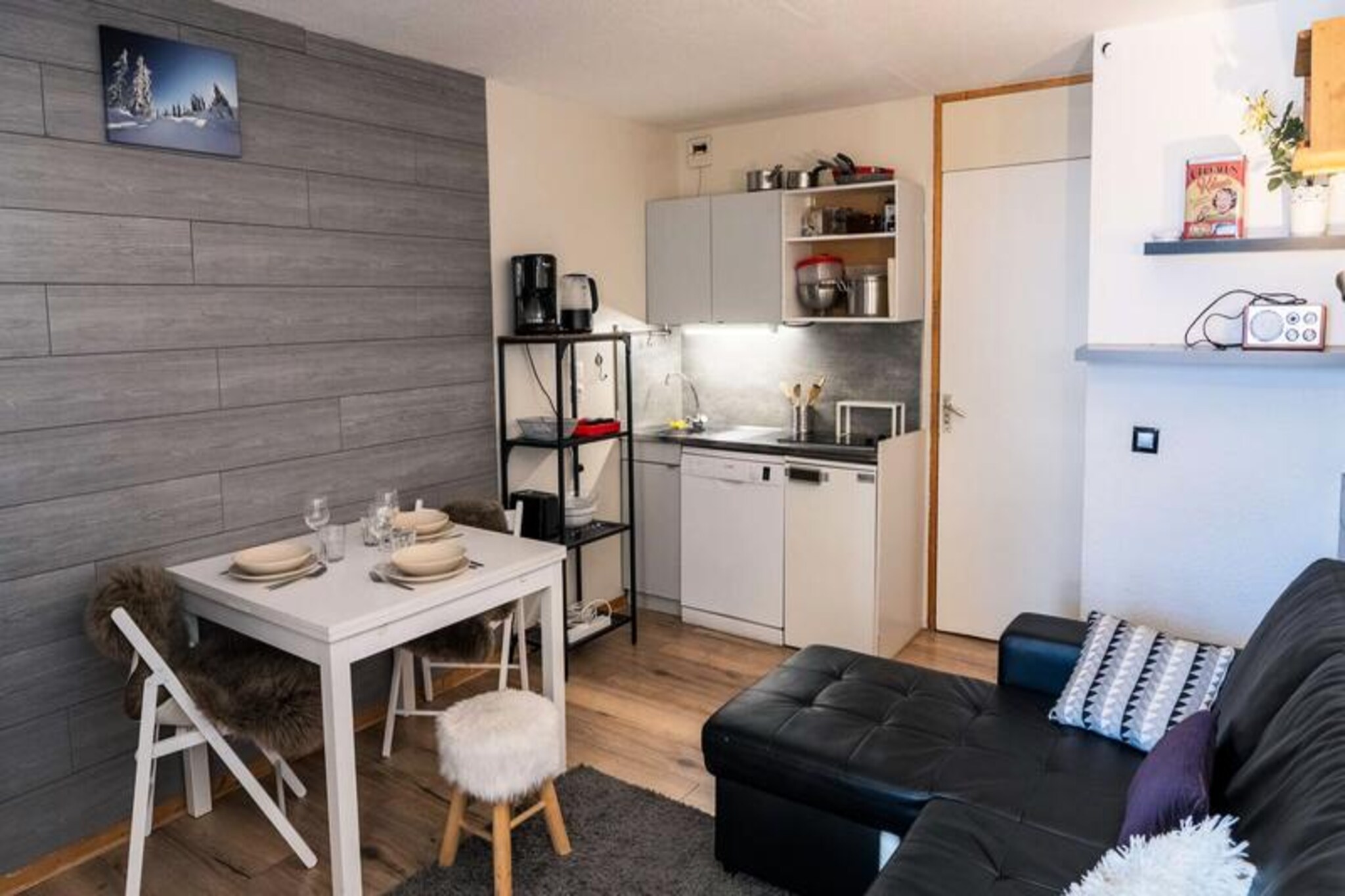 High above the bustling streets of Val Thorens, this charming 27 m² apartment offers a cozy retreat for up to five guests. From its southwest-facing balcony, you’ll be treated to stunning views of the slopes and surrounding mountains, making it the perfect spot to enjoy a morning coffee or unwind after a day of alpine adventure. Whether you’re here to ski, hike, or simply relax, this property provides an inviting base for your mountain getaway. \n\nInside, the apartment is thoughtfully designed for comfort and convenience. The living room features a double sofa bed and a TV, creating a warm space to gather with loved ones. The fully equipped kitchenette includes everything you need to prepare meals, from a ceramic hob and dishwasher to a toaster and kettle. The bedroom, with three single beds, ensures restful nights for all, while the bathroom and separate toilet add practicality to your stay. Additional amenities such as a ski locker and vacuum cleaner enhance the ease of your experience. \n\nSituated within the lively Pichu residence, you’ll find a mini-market, restaurants, and shops right at your doorstep. The residence’s prime location at the foot of the slopes means you can step outside and immediately immerse yourself in the vibrant energy of Val Thorens. Whether you’re seeking thrilling descents or après-ski indulgence, everything is within easy reach. \n\nChoose this apartment for its unbeatable location, cozy ambiance, and breathtaking views. It’s more than just a place to stay—it’s your gateway to the unforgettable charm of the French Alps.
