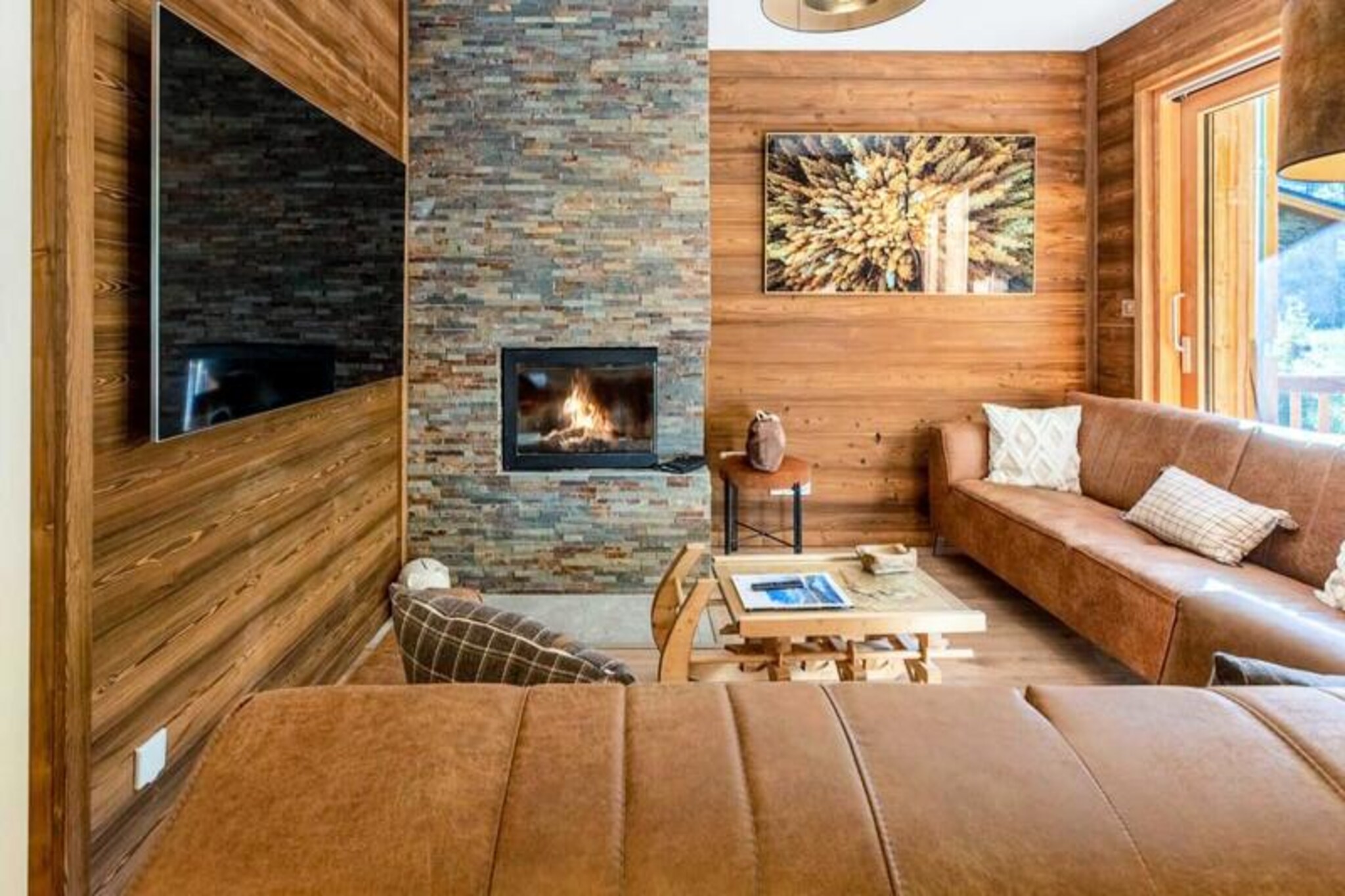 In the charming village of Les Allues, surrounded by the breathtaking beauty of the Méribel valley, this luxurious chalet offers an unforgettable alpine retreat. Just 400 meters from the Olympe ski lift, it provides seamless access to the world-renowned 3 Valleys ski area, making it a dream destination for winter sports enthusiasts and nature lovers alike. From the moment you step inside, the chalet’s exquisite craftsmanship and attention to detail create an atmosphere of refined elegance and comfort.
The ground floor features a modern, fully equipped kitchen that flows into a sophisticated dining area, perfect for sharing meals with loved ones. The cozy living room, complete with a stunning fireplace, invites you to unwind after a day on the slopes. Upstairs, three beautifully appointed double bedrooms, two of which are en suite, ensure restful nights, while the second floor offers a dormitory with five single beds, ideal for families or groups. A private garden with an outdoor jacuzzi and a barbecue adds to the chalet’s allure, providing a serene space to relax under the stars.
Beyond the chalet, the vibrant Méribel Centre is just a short distance away, offering a variety of bars, restaurants, and shops. The Olympic Park, with its swimming pool, ice rink, and bowling alley, promises entertainment for all ages. Free shuttles make it easy to explore the valley, from the lively Chaudanne plateau to the picturesque slopes of Courchevel and Les Menuires.
Whether you’re seeking adventure or tranquility, this chalet offers the perfect blend of luxury and alpine charm. With additional services such as ski pass delivery, equipment rentals, and private chef options, every detail is designed to make your stay truly exceptional. Let the magic of the mountains captivate you in this extraordinary retreat.