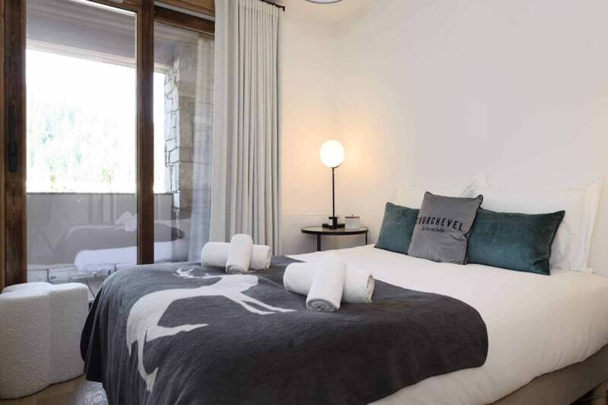 High above the picturesque Courchevel Moriond, this sleek and modern apartment offers a serene retreat for those seeking the perfect alpine getaway. With its minimalist decor and thoughtful design, this residence is a haven for families or couples looking to immerse themselves in the beauty of the French Alps. The ski-in/ski-out location ensures that the slopes are always just a step away, making it an ideal choice for winter sports enthusiasts. Wake up to breathtaking mountain views from your private balcony and let the crisp alpine air invigorate your senses.
Inside, the 46 m² apartment is designed for comfort and convenience. The open-plan living and dining area is a cozy space to relax after a day on the slopes, complete with a television and access to the balcony. The fully equipped kitchen invites you to prepare hearty meals, while the sleeping arrangements cater to both families and small groups. The master bedroom features a luxurious 180x200 cm bed and balcony access, while the sleeping alcove with bunk beds is perfect for children or additional guests. Modern amenities such as Wi-Fi, a ski locker, and a covered parking space ensure a seamless stay.
Beyond the apartment, Courchevel Moriond offers a vibrant mix of local shops, gourmet delis, and ski rental services right at your doorstep. The Petit Moriond gondola lift is conveniently accessible via the residence, and the Ariondaz piste brings you back to your home base with ease. Whether you're exploring the pristine slopes or indulging in après-ski delights, this location places you in the heart of it all.
With personalized concierge services, luxury linens, and end-of-stay cleaning included, every detail is taken care of to ensure a stress-free and memorable holiday. From arranging ski passes and lessons to booking private chefs or mid-stay cleaning, your every need is catered to. Experience the magic of Courchevel Moriond and create unforgettable memories in this exceptional alpine retreat.