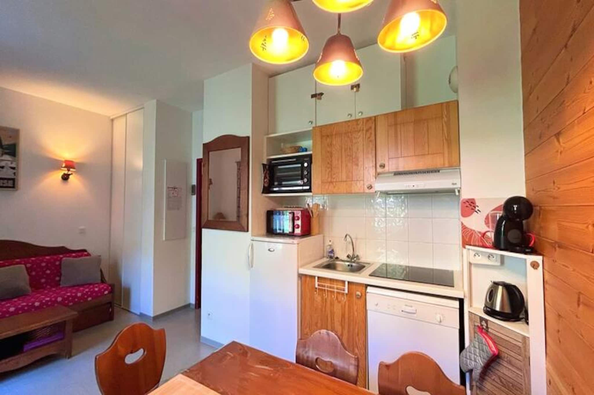 Amidst the breathtaking landscapes of the Écrins National Park, this cozy 39 m² apartment offers the perfect retreat for mountain enthusiasts, whether you're seeking snowy adventures or summer escapades. With its serene setting in the family-friendly resort of Vallouise-Pelvoux, this property invites you to immerse yourself in the beauty of the French Alps, surrounded by pristine nature and endless outdoor activities. Imagine waking up to crisp alpine air and stepping directly onto the slopes or trails just moments from your door. \n\nDesigned to accommodate up to six guests, the apartment features a thoughtfully arranged layout. The bedroom boasts a comfortable double bed, while a sleeping alcove with bunk beds provides a fun and practical space for children or friends. The bright living area combines a lounge, dining space, and a fully equipped open-plan kitchen, perfect for preparing meals after a day of exploration. The sofa bed offers additional sleeping options, and the large bay window opens onto a terrace and garden, creating a seamless connection with the outdoors. A bathroom with a relaxing bathtub completes the space, ensuring comfort and convenience. \n\nIn winter, the Pelvoux-Vallouise resort becomes a haven for skiing, snowboarding, sledding, and cross-country skiing, with direct access to the slopes. Snowshoeing and ski touring trails abound, offering opportunities to explore the untouched beauty of the surrounding valleys. Summer transforms the region into a paradise for hikers and climbers, with iconic trails leading to Glacier Blanc, Pré de Madame Carle, and the majestic peaks of the Écrins massif. Nearby Ailefroide serves as a gateway to unforgettable alpine adventures. \n\nWhether you’re seeking tranquility or thrilling activities, this charming apartment is your gateway to the wonders of the mountains. Experience the magic of Vallouise-Pelvoux and create memories that will last a lifetime.