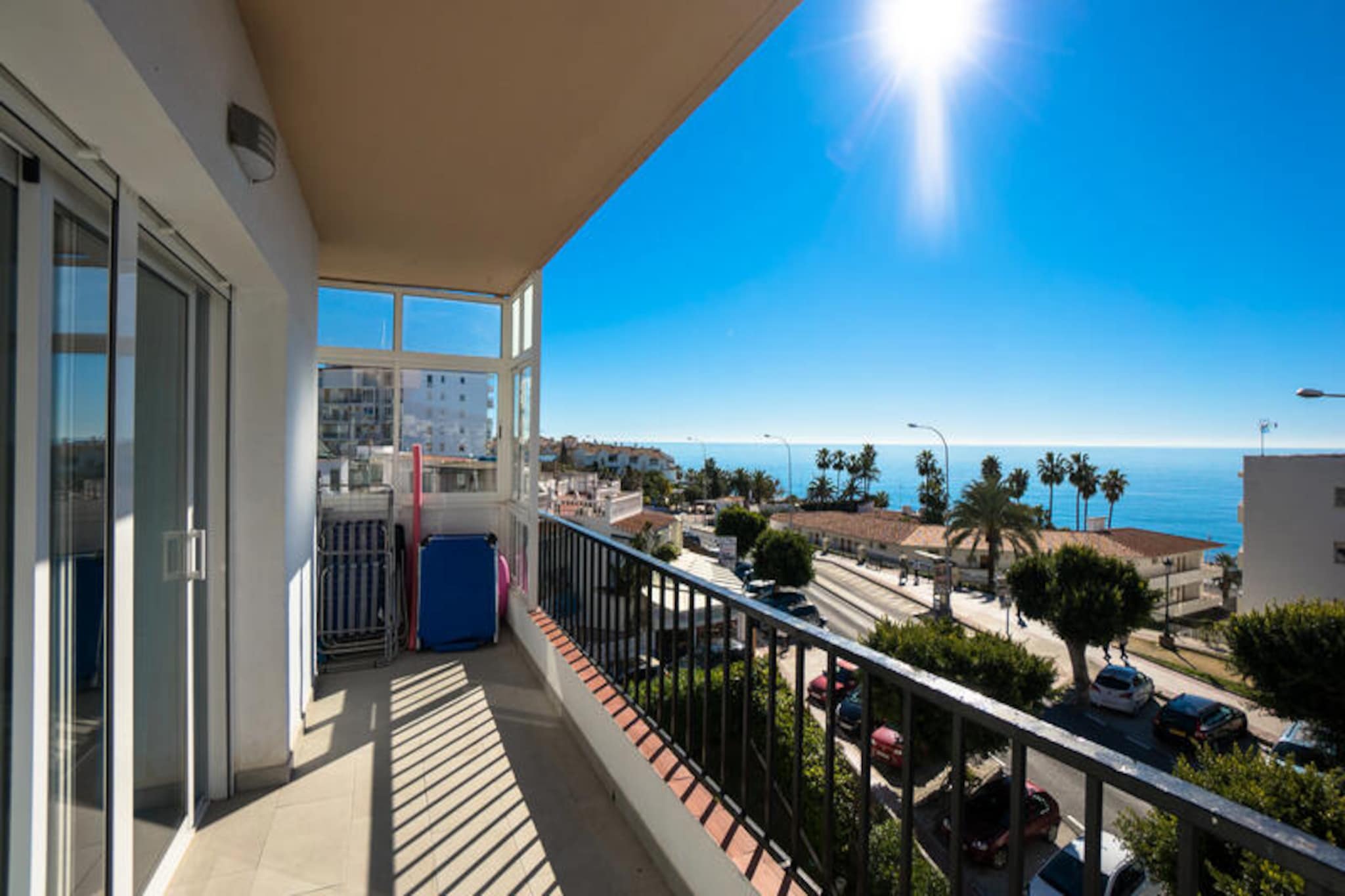 Imagine waking up to the soothing sound of waves and the golden hues of the Mediterranean sun streaming through your window. This stunning beachfront apartment in the heart of Nerja offers the perfect blend of modern comfort and coastal charm, making it an ideal retreat for families or groups of up to eight people. Recently renovated and thoughtfully furnished, every detail has been designed to ensure a relaxing and memorable stay. From its prime location just 100 meters from Torrecilla Beach to its breathtaking sea views from multiple terraces, this property is a true gem on the Costa del Sol.
Inside, you’ll find four spacious bedrooms, two modern bathrooms, and a bright living/dining area that opens up to the terraces. The separate, fully equipped kitchen is perfect for preparing meals to enjoy al fresco while taking in the sea breeze. With air conditioning in every room, satellite TV featuring Spanish, English, and German channels, and free Wi-Fi, you’ll have all the comforts of home at your fingertips. Please note that pets are not allowed, and while the communal pool is unavailable in 2025, the nearby beach more than makes up for it.
Step outside, and you’re immediately surrounded by the vibrant life of Nerja. Shops, restaurants, bars, and local attractions are all within walking distance, offering endless opportunities to explore and indulge. For an extra touch of luxury, guests can access the exclusive CLUB NERJA SPA, located in the San Juan de Capistrano urbanization. With its heated pool, Roman bath, jacuzzi, sauna, and hammam, it’s the perfect place to unwind after a day of adventure.
Whether you’re seeking a sun-soaked escape, a cultural exploration, or a rejuvenating retreat, this apartment is your gateway to the best of Nerja. Book now and let the magic of the Costa del Sol create memories that will last a lifetime.