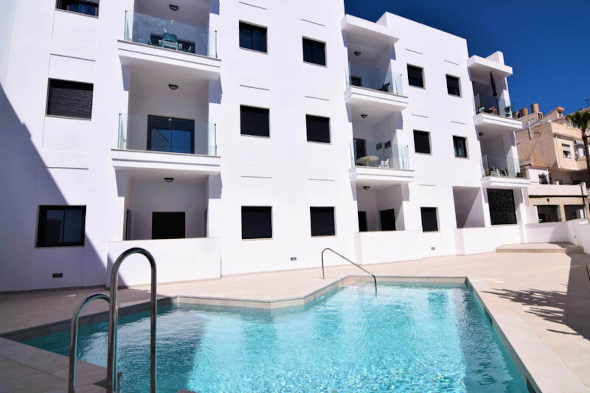 In the heart of Nerja, where Andalusian charm meets the Mediterranean breeze, this stylish two-bedroom apartment offers a serene escape for up to four guests. Recently built and thoughtfully designed, it provides a perfect blend of modern comfort and coastal relaxation. Imagine waking up to the gentle sound of the waves, with the vibrant town center and its array of cafes and restaurants just steps away. Whether you're here for a romantic getaway or a family retreat, this apartment is your gateway to the best of southern Spain. 
 
 Inside, the 65 m² space is tastefully furnished with a contemporary touch. The open-plan living area flows seamlessly into an American-style kitchen, fully equipped with an induction cooktop, refrigerator, oven, dishwasher, and all the essentials for preparing delicious meals. The two cozy bedrooms promise restful nights, while the balcony invites you to unwind with a view of the sparkling communal pool. Modern amenities such as WiFi, a flat-screen TV, heating, and a washing machine ensure a comfortable stay year-round.
 
 Step outside, and you'll find yourself just 300 meters from the golden sands of Playa Burriana and the picturesque Playa Carabeillo. The nearby supermarket, cafes, and restaurants make it easy to immerse yourself in the local lifestyle. For nature enthusiasts, the stunning cliffs of Maro-Cerro Gordo Natural Park and the serene Río Chillar are just a short drive away, offering hiking trails and breathtaking scenery. Golf lovers can tee off at Baviera Golf, just 20 km from the property, while families will enjoy the nearby Aquavelis Water Park.
 
 Whether you're exploring the historic streets of Nerja, savoring fresh seafood by the beach, or simply relaxing by the pool, this apartment is your perfect home base. Discover the magic of the Costa del Sol and create unforgettable memories in this idyllic retreat.