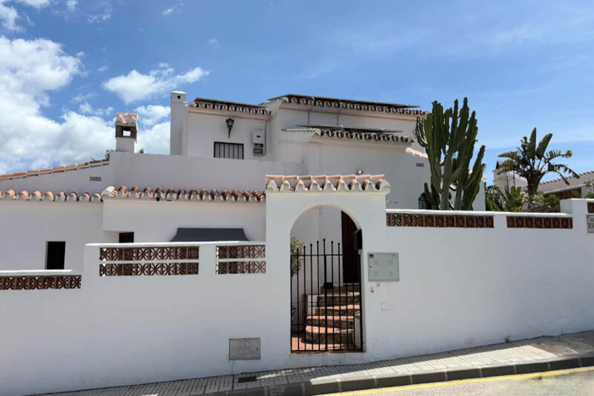 In the heart of Andalusia, where the Mediterranean breeze meets the charm of whitewashed villages, this delightful villa in Nerja invites you to unwind and embrace the Spanish way of life. With its serene surroundings and breathtaking views, it offers a perfect retreat for families or friends seeking both relaxation and adventure. Imagine waking up to the gentle rustle of palm trees and spending your days basking in the golden sun by your private pool. 

The villa features three spacious bedrooms, comfortably accommodating up to six guests. Its 105 m² of living space is thoughtfully designed to combine traditional Andalusian style with modern amenities. The separate gas-powered kitchen is fully equipped with everything you need, from a refrigerator and dishwasher to a coffee maker and juicer, making it easy to prepare meals to enjoy in the garden or on the terrace. With air conditioning, heating, WiFi, and a TV, your comfort is guaranteed year-round. The outdoor space includes a lush garden, barbecue area, and private parking, ensuring a seamless holiday experience. 

Located just 3 km from the sandy shores of Playa Torrecilla and the charming town center of Nerja, the villa is perfectly positioned to explore the region. Discover the dramatic cliffs of the Maro-Cerro Gordo Natural Park, just 13 km away, or take a scenic drive to the tranquil Embalse de La Viñuela lake. For golf enthusiasts, Baviera Golf is only 19 km away, while families can enjoy a day at the Aquaveliz water park in Vélez-Málaga. With Málaga airport just 70 km away, your Andalusian escape is closer than you think. 

Whether you’re strolling through Nerja’s cobblestone streets, savoring tapas at a local café, or simply soaking up the sun by the pool, this villa offers the perfect base for an unforgettable holiday in southern Spain.