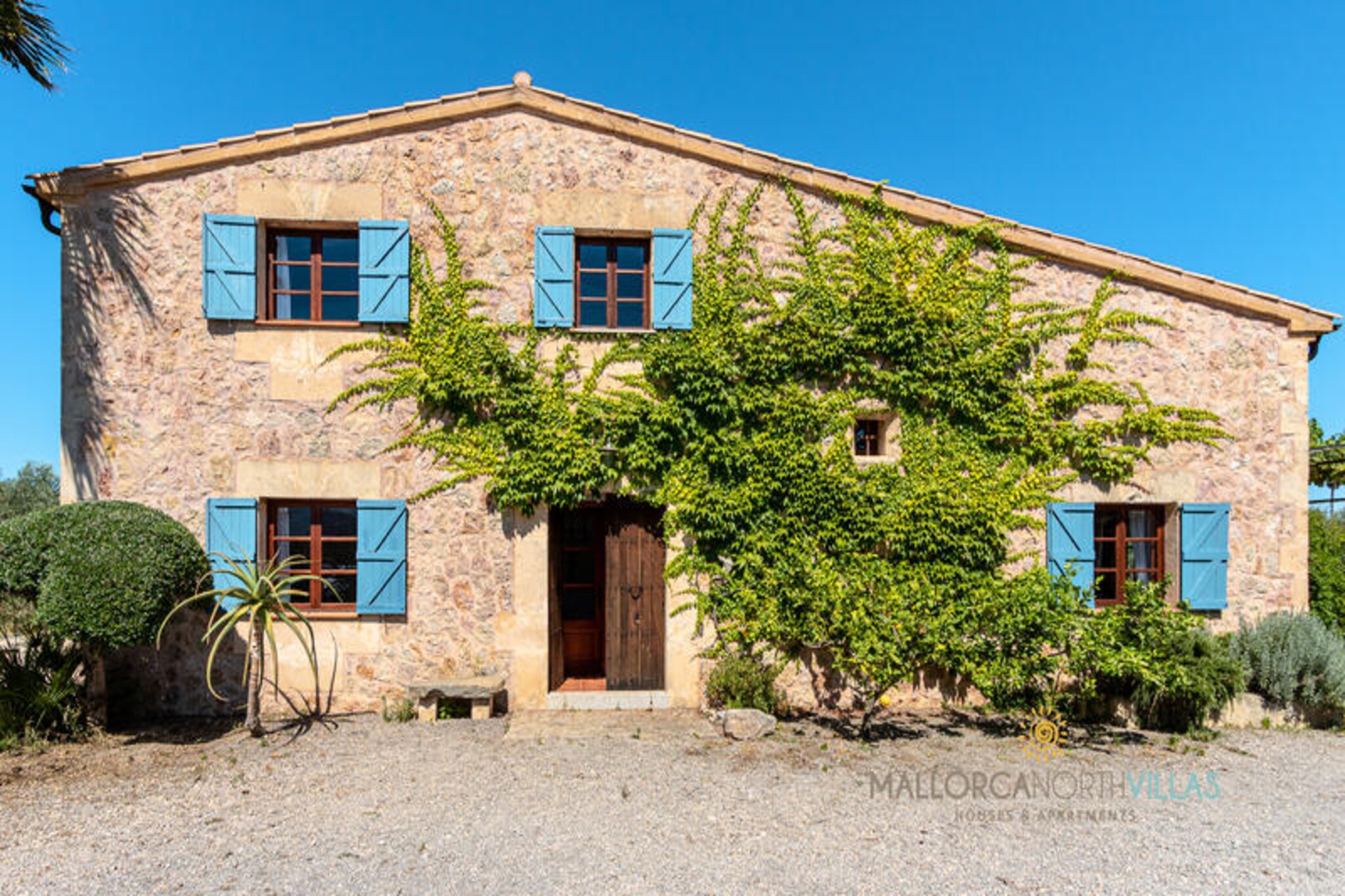 Amidst the rolling countryside of Mallorca, this enchanting villa offers a serene escape for families and friends. Surrounded by lush greenery and just a short drive from the golden sands of Alcúdia and Playa de Muro, it’s the perfect blend of tranquil seclusion and coastal adventure. Wake up to the gentle sounds of nature, sip your morning coffee on the sunlit terrace, and let the breathtaking mountain views set the tone for your day. \n\nDesigned to accommodate up to 8 guests, the villa boasts 4 spacious bedrooms and 3 modern bathrooms, ensuring comfort and privacy for all. The fully equipped kitchen invites you to prepare delicious meals with ease, while the cozy living area, complete with a fireplace, offers a warm retreat on cooler evenings. Stay connected with complimentary Wi-Fi throughout the property, making it easy to share your holiday moments. \n\nStep outside to discover the villa’s stunning outdoor spaces. Dive into the private 8x4m pool, bask in the Mediterranean sun on the expansive 30 m² terrace, or explore the sprawling 8,000 m² garden, perfect for games, barbecues, or simply unwinding with a good book. With private parking for three vehicles and a pet-friendly policy, this villa ensures every member of your group feels at home. \n\nLocated in a peaceful rural area, yet close to local restaurants, shops, and outdoor activities, this villa offers the best of Mallorca. Whether you’re seeking relaxation or adventure, your dream holiday begins here. Book now and create unforgettable memories in this idyllic retreat.