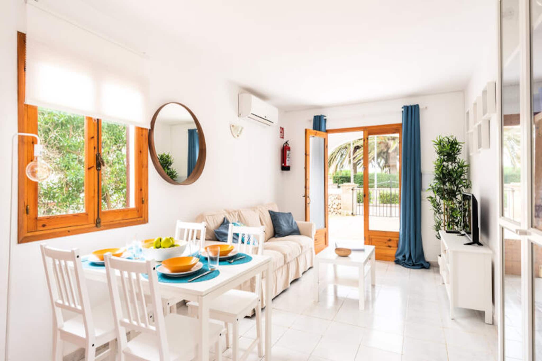 Apartment in Cala Blanca with Pool Views
