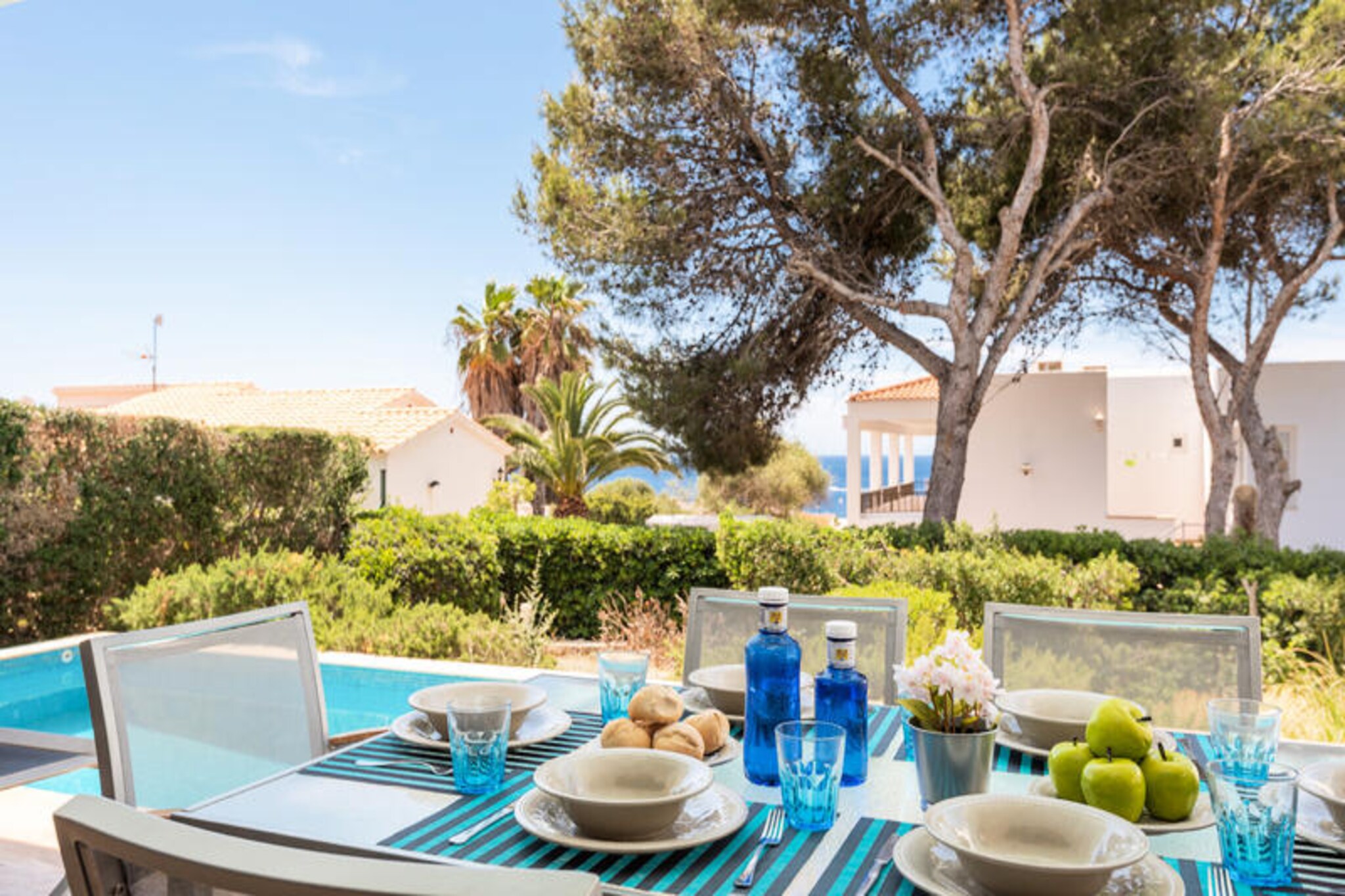 A tranquil escape awaits you in the charming villa of Binibequer, where Mediterranean beauty meets modern comfort. Surrounded by lush gardens and a private swimming pool, this idyllic retreat offers a serene setting for families or groups of up to six guests. Imagine waking up to the gentle rustle of palm trees and the warm Menorcan sun, ready to explore the nearby sandy beaches or simply relax in your own slice of paradise. The villa’s inviting atmosphere and thoughtful design promise unforgettable moments under the Spanish sky.
Inside, the villa boasts three spacious bedrooms and a fully equipped kitchen, perfect for preparing meals with fresh local ingredients. The bright and airy living spaces are complemented by modern amenities such as air conditioning, Wi-Fi, and satellite TV, ensuring a comfortable stay. Step outside to discover a 30 m² terrace with garden furniture and a barbecue, ideal for al fresco dining or enjoying a quiet evening with loved ones. The fenced garden and private parking add an extra layer of convenience and security for your holiday.
Located just 500 meters from local restaurants and bus connections, and only 2 kilometers from the sandy shores of Cala Binibequer, the villa is perfectly situated for exploring the best of Menorca. Venture further to discover the vibrant town of Mao, the bustling Mercadona and Lidl supermarkets, or the scenic Son Parc Golf Course, all within easy reach. Whether you’re seeking relaxation or adventure, this villa places you at the heart of it all.
Let the enchanting surroundings and warm hospitality of Binibequer create lasting memories for you and your loved ones. With its blend of comfort, convenience, and natural beauty, this villa is your gateway to an unforgettable Menorcan holiday.