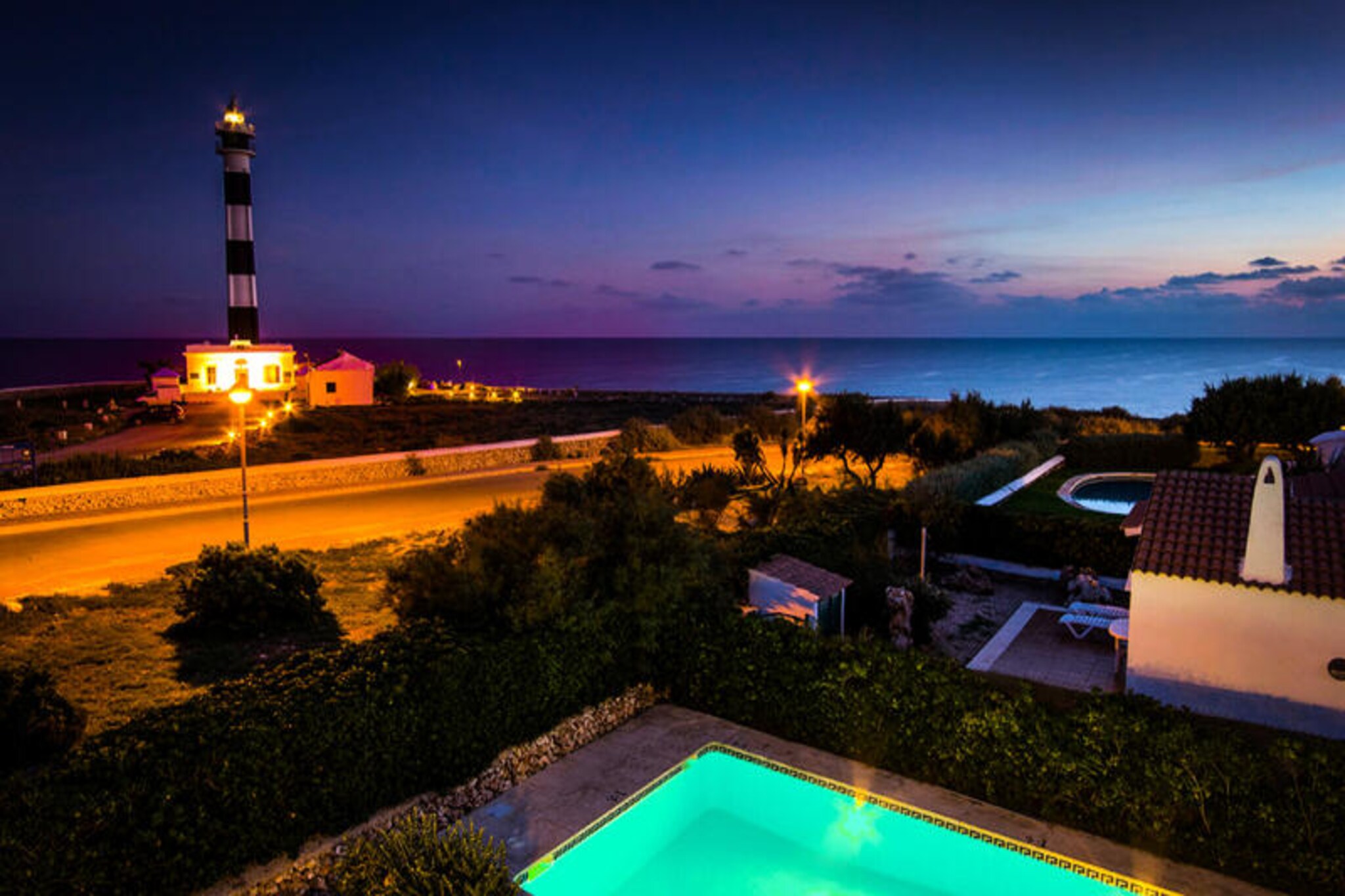 On the sun-drenched coast of Cap d'Artruix, this charming villa offers a serene escape with breathtaking sea views and a tranquil ambiance. Perfectly designed for families or groups of up to six, this bright and inviting 90 m² retreat is a haven for relaxation and coastal living. Just a short stroll from the sparkling waters of Calan Bosch beach, it’s an ideal base for exploring the natural beauty and vibrant culture of Menorca. \n\nStep inside to discover a thoughtfully furnished space featuring three comfortable bedrooms, a spacious living area, and a fully equipped American-style kitchen with modern amenities such as a ceramic hob, dishwasher, and coffee maker. The villa’s airy interiors are complemented by a private garden, a sunlit terrace, and a refreshing private pool, perfect for cooling off on warm Mediterranean afternoons. Additional comforts include air conditioning, Wi-Fi, satellite TV, and a washing machine, ensuring a seamless and enjoyable stay.\n\nBeyond the villa, the local area offers a wealth of attractions. The sandy shores of Playa Calan Bosch are just 1 km away, while the charming town of Ciutadella, with its historic streets and lively atmosphere, is a mere 7 km drive. Golf enthusiasts can enjoy a round at the prestigious Club de Golf Son Parc, located 24 km away, and the vibrant Mahon Airport is conveniently situated 35 km from the property. Supermarkets, restaurants, and a bus station are all within walking distance, making it easy to explore the island’s treasures.\n\nWhether you’re soaking up the sun by the pool, enjoying a barbecue in the garden, or venturing out to discover Menorca’s stunning coastline, this villa promises an unforgettable Mediterranean getaway.