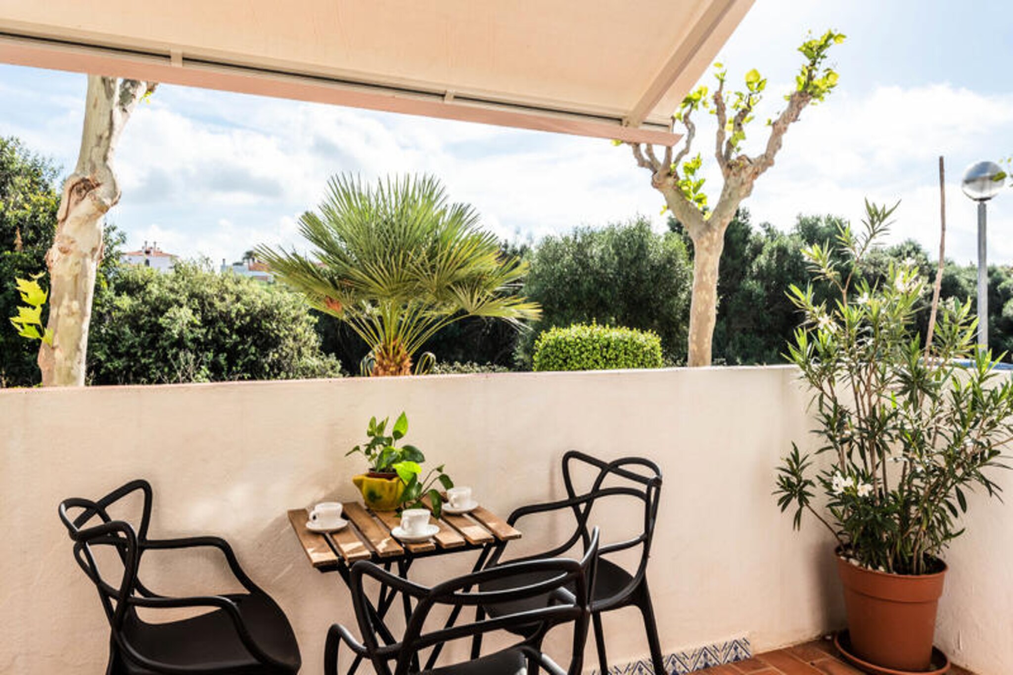 Imagine waking up to the gentle Mediterranean breeze and stepping onto one of the apartment’s charming terraces, where the sun greets you with warmth and tranquility. This delightful holiday retreat, designed for up to four guests, offers the perfect blend of comfort and convenience. Whether you’re sipping coffee on the patio or enjoying a refreshing shower after a day at the beach, every detail has been thoughtfully arranged to ensure a relaxing stay. With air conditioning in the living room and master bedroom, you’ll find respite from the summer heat, making it an ideal haven for your vacation.
Located in a welcoming neighborhood, this apartment is just a short stroll from the golden sands of the nearby beach. A local restaurant and park are mere meters away, offering opportunities for leisurely meals and peaceful walks. The historic Ciutadella is also close by, inviting you to explore its rich cultural heritage and charming streets. Whether you’re seeking adventure or serenity, this location provides the best of both worlds.
Designed with your summer comfort in mind, this property is a true gem for those looking to unwind and create lasting memories. From its convenient amenities to its prime location, it’s the perfect choice for a getaway that combines relaxation, exploration, and the vibrant spirit of the Mediterranean. We can’t wait to welcome you and help you experience the magic of this beautiful destination.