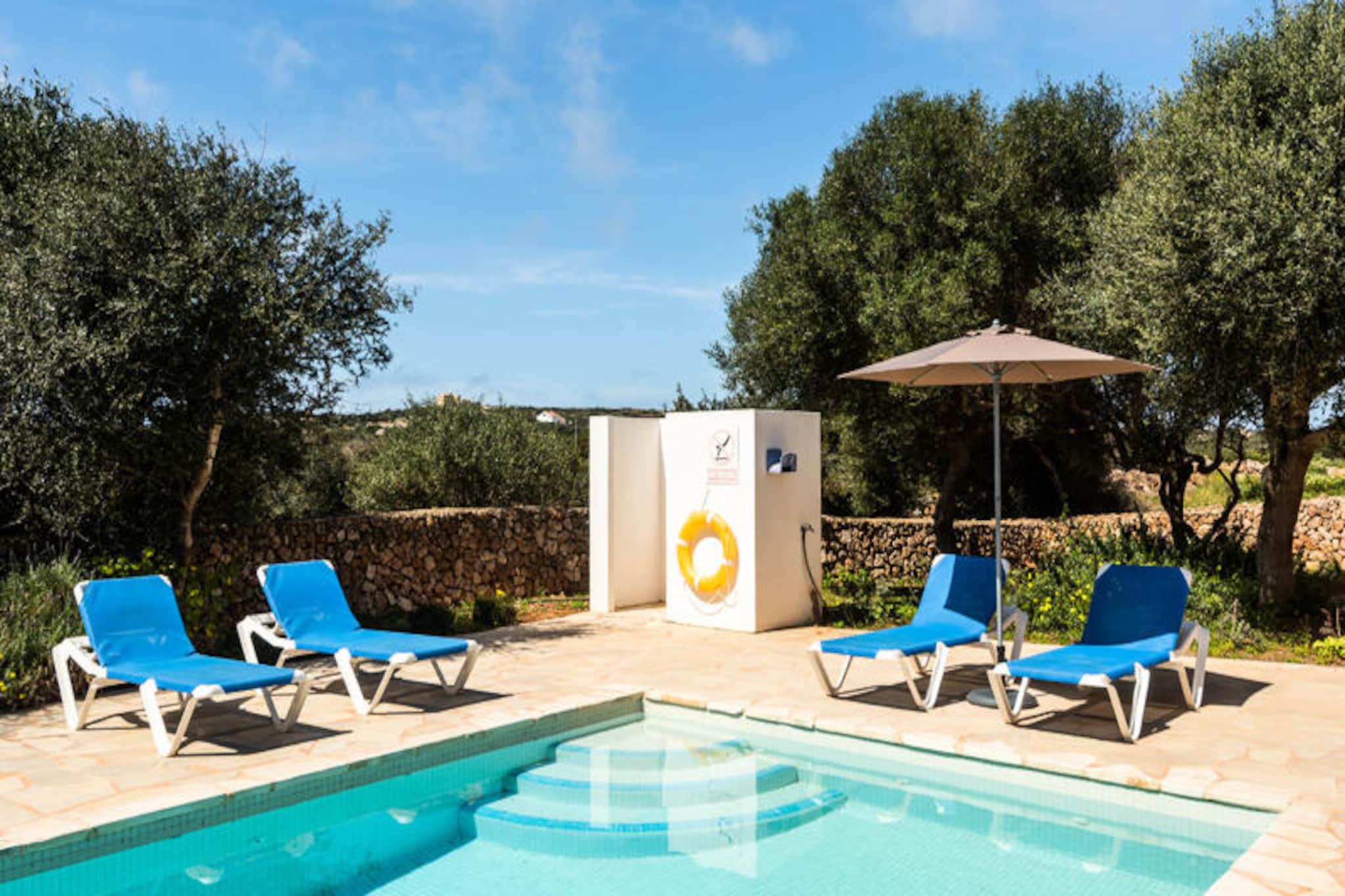 Imagine a serene retreat where the Mediterranean breeze whispers through the trees, and the charm of Menorca surrounds you. This bright and inviting 3-bedroom villa, just a short 2-minute drive from the historic town of Ciutadella de Menorca, offers the perfect balance of tranquility and modern comfort. Whether you're seeking a peaceful family getaway, a romantic escape, or a productive workcation, this villa is designed to meet your every need. Challenge your loved ones to a game of ping-pong or unwind in the lush private garden, where relaxation comes naturally. \n\nThe villa spans 140 m² of thoughtfully designed living space, featuring air-conditioned bedrooms and a cozy living room for year-round comfort. The fully equipped kitchen, complete with a Nespresso machine, dishwasher, and oven, invites you to create culinary delights, while the two modern bathrooms with showers ensure convenience for all guests. The three bedrooms, including one with a double bed and two with twin beds, provide restful havens after a day of exploration. Stay connected with free Wi-Fi and enjoy your favorite shows on satellite TV.\n\nStep outside to discover your private oasis. The 40 m² garden is perfect for al fresco dining on the terrace, complete with a barbecue for memorable evenings under the stars. The villa’s rural setting offers a peaceful ambiance, yet it’s conveniently close to the vibrant streets of Ciutadella, where you can explore local markets, historic landmarks, and exquisite dining options.\n\nWhether you're soaking up the sun, exploring Menorca's pristine beaches, or simply enjoying the villa's many comforts, this property promises an unforgettable escape. Let the beauty of Menorca and the warmth of this villa create memories you'll cherish forever.