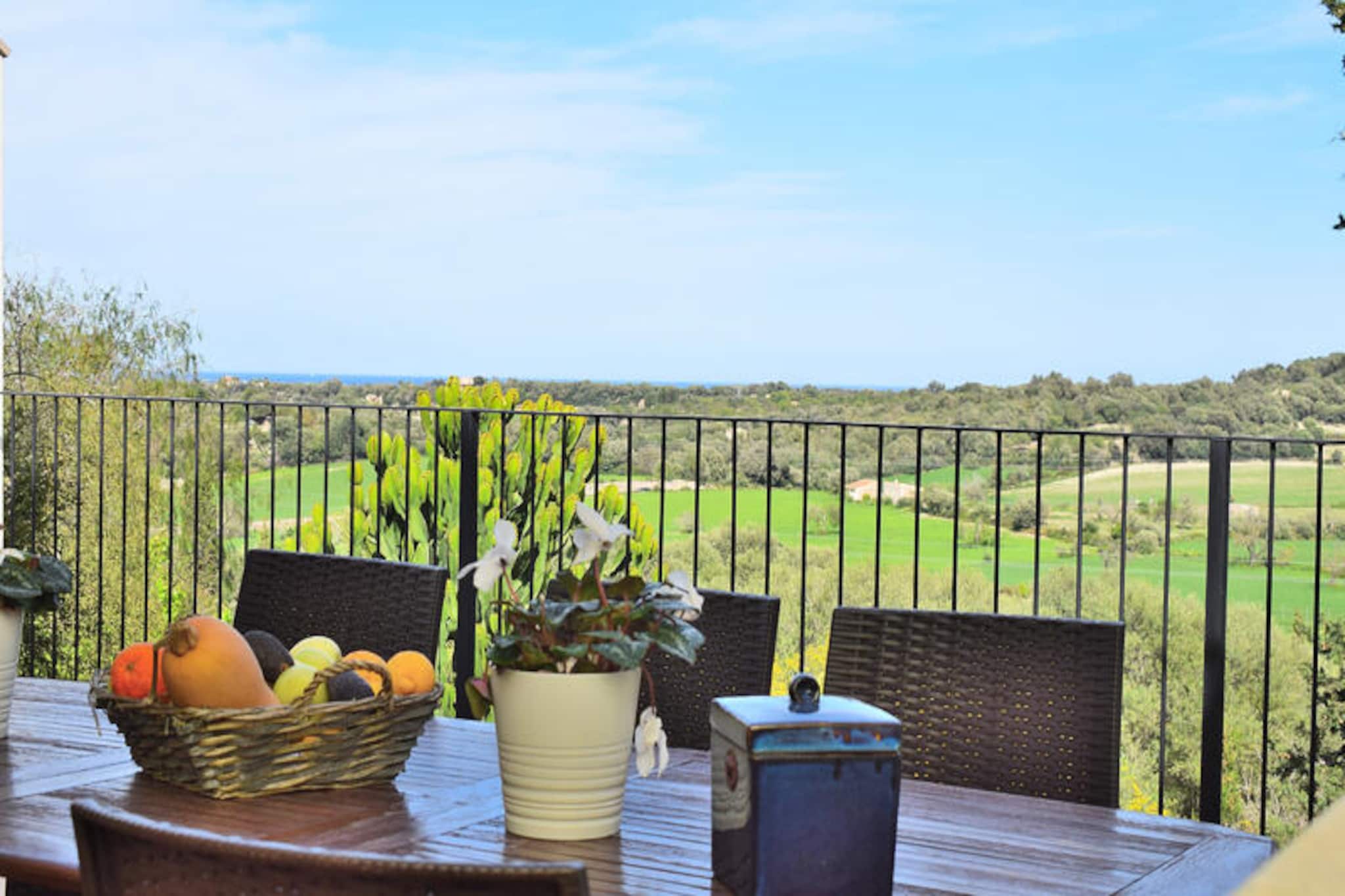 Set amidst the tranquil charm of Muro, this spacious two-story house offers an idyllic retreat for those seeking peace and comfort in the heart of Mallorca. From the moment you step into the welcoming entrance, you’ll be captivated by the serene atmosphere and breathtaking views of Alcudia Bay from the terrace. Whether you’re sipping coffee at sunrise or unwinding after a day of exploration, the panorama promises unforgettable moments. The ground floor features a cozy bedroom, a modern bathroom, a stylish living room, and the terrace, creating the perfect blend of relaxation and functionality. Upstairs, two additional bedrooms await, along with another bathroom and a dedicated study room, ideal for work or quiet reflection during your stay. The house is elegantly furnished, with high-speed internet and a fully equipped kitchen that invites you to prepare delicious meals. Choose between indoor dining or al fresco experiences under the Mediterranean sky. Located in a peaceful residential area, this home is just a 15-minute drive from pristine beaches, making it the perfect base for exploring Mallorca’s natural wonders. Muro itself enchants with its cobbled streets, traditional Mallorcan architecture, and vibrant local culture. Whether you’re strolling through the village or savoring exquisite cuisine, you’ll discover the authentic essence of the island. With its blend of tranquility, modern amenities, and proximity to stunning landscapes, this property promises a holiday filled with beauty and relaxation.