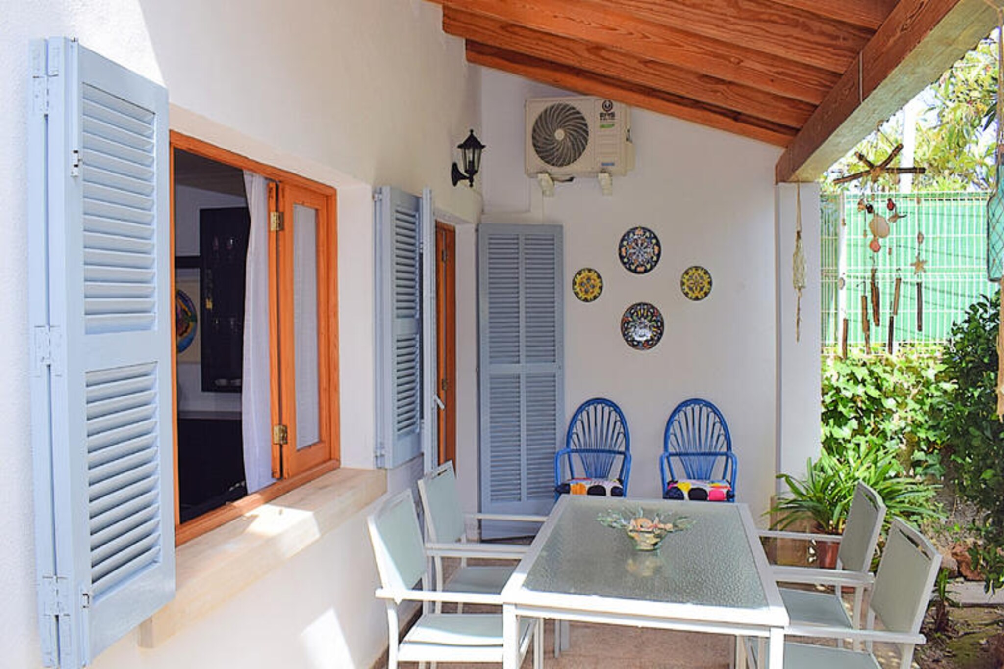 Step into the heart of Mallorca’s charm with this delightful holiday home, just a stone’s throw from the beach in the vibrant coastal town of Can Picafort. Imagine waking up to the gentle sound of waves, strolling 150 meters to the golden sands, and immersing yourself in the lively Mediterranean atmosphere. This home offers the perfect retreat for families or small groups seeking a blend of relaxation and adventure on one of Spain’s most beloved islands.
Spanning two floors and 120 m² of living space, the house is designed for comfort and convenience. The ground floor features a fully equipped kitchen, a guest toilet, and a cozy living and dining area that opens onto a covered terrace. This outdoor space, furnished with comfortable garden furniture, invites you to enjoy al fresco meals or unwind with a glass of wine as the sun sets. Upstairs, you’ll find three inviting bedrooms—one with a double bed and two with single beds—along with a modern bathroom featuring a shower-bath. With thoughtful amenities and a welcoming ambiance, this home ensures a memorable stay.
Beyond the property, Can Picafort beckons with its crystal-clear waters, vibrant local culture, and a variety of shops, restaurants, and bars all within easy reach. Whether you’re exploring the scenic coastline, savoring Mallorcan delicacies, or enjoying the lively nightlife, there’s something for everyone. The strategic location also makes it a great base for discovering the island’s hidden gems and natural wonders.
Choose this charming holiday home for your next getaway and experience the magic of Mallorca. With its unbeatable location, comfortable amenities, and the allure of Can Picafort, it’s the perfect setting for creating unforgettable memories.