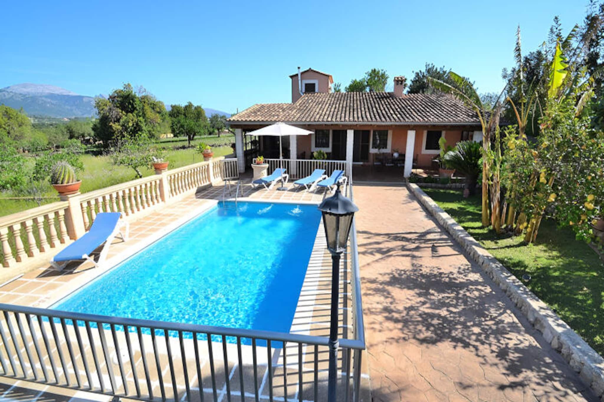Amidst the rolling hills of Mallorca, this stunning villa offers an idyllic retreat with breathtaking views of the Serra de Tramuntana mountains. Perfect for families or groups seeking a serene escape, the property is conveniently located between Campanet and Inca, with the golden beaches of Pollensa Bay and Alcudia Bay just a 20-minute drive away. Here, you’ll find the perfect balance of tranquility and accessibility, surrounded by the island’s natural beauty. \n\nThe villa is designed for comfort and relaxation, featuring a spacious living and dining area equipped with satellite TV, a CD and DVD player, and Wi-Fi. The open-plan kitchen is fully equipped with modern appliances, including a dishwasher and washing machine, and offers direct access to the rear terrace. The property boasts three cozy bedrooms, each with two single beds, and two bathrooms with showers and toilets. Outside, a private swimming pool, which can be enclosed for child safety, invites you to unwind under the Mediterranean sun. A wide porch with outdoor furniture and a large terrace with a barbecue area provide the perfect setting for al fresco dining and memorable evenings with loved ones.\n\nThe villa’s location is ideal for exploring the vibrant town of Inca, just 3 km away, where you can discover local markets, charming restaurants, and cultural attractions. Golf enthusiasts will appreciate the proximity to Aucanada Golf and Golf Pollença, both reachable within 20 minutes. Whether you’re seeking adventure or relaxation, this property places you at the heart of Mallorca’s treasures.\n\nWith its panoramic views, modern amenities, and prime location, this villa is the perfect choice for an unforgettable Mallorcan getaway. Let the serene countryside and warm Mediterranean breeze create memories that will last a lifetime.