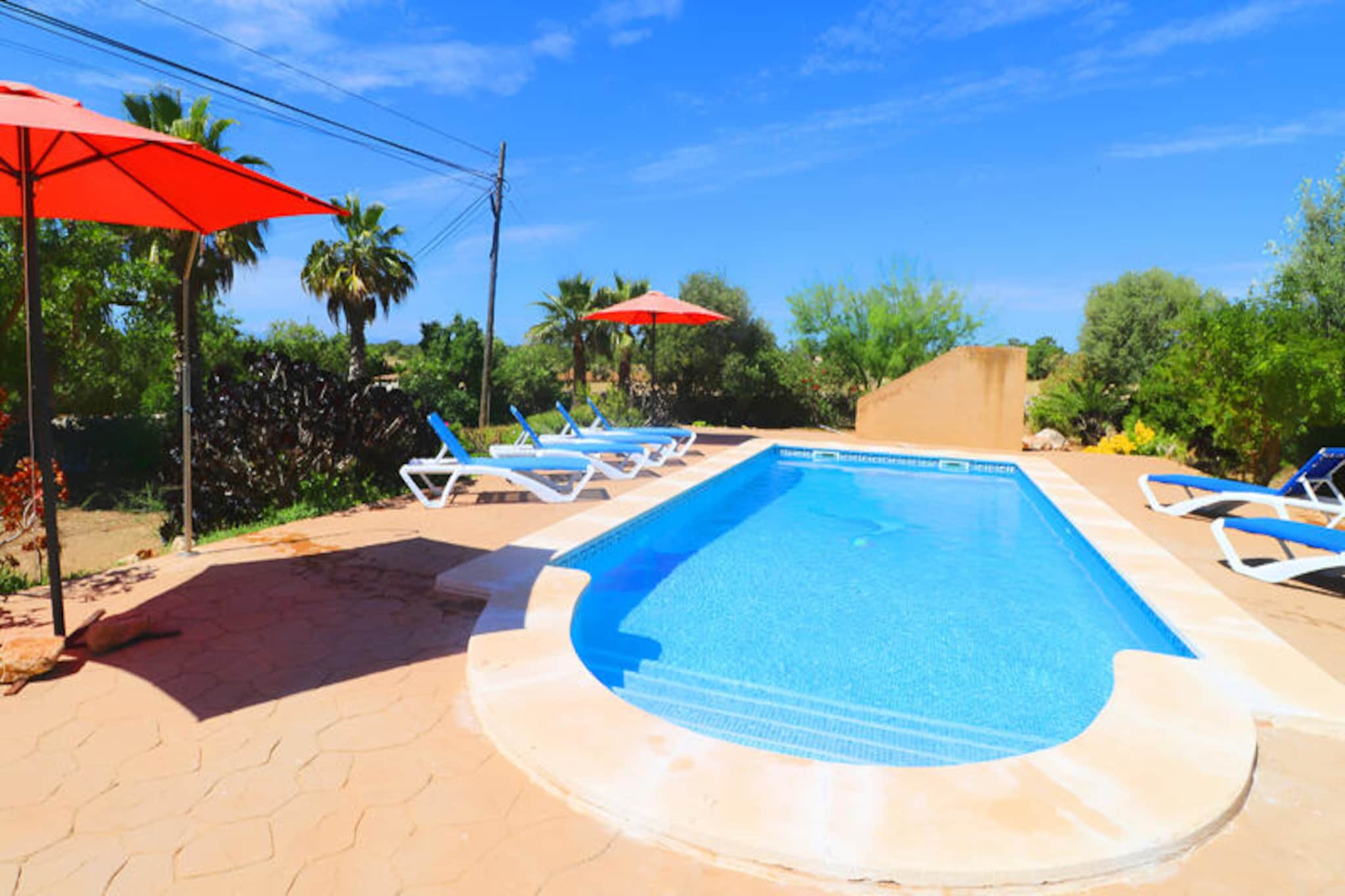 Amidst the serene countryside of Mallorca, this charming farmhouse invites you to experience the island’s authentic beauty. Surrounded by lush gardens and ancient stone walls, the property exudes tranquility and offers a peaceful retreat for families or groups of friends seeking relaxation and connection with nature. Just minutes away from Es Llombards and Santanyí, you’ll find yourself immersed in the vibrant local culture, with access to restaurants, shops, and some of Mallorca’s most stunning beaches like Cala Llombards and S'Almoina.
Inside, the farmhouse boasts 200 m² of carefully designed living space, comfortably accommodating up to six guests. The spacious dining room leads to a fully equipped kitchen, perfect for preparing meals with fresh local ingredients. The cozy living room features two sofas, satellite TV, and Wi-Fi, ensuring comfort and entertainment throughout your stay. Three inviting bedrooms—one double and two twin—along with two bathrooms, provide ample space for relaxation. A separate guesthouse with a barbecue and dining area adds to the charm, offering a delightful space for al fresco meals.
The outdoor area is a true highlight, with a magnificent garden filled with Mediterranean plants and multiple relaxation spots. The large 8x4m swimming pool promises refreshing moments under the Mallorcan sun, while comfortable loungers invite you to unwind and soak in the peaceful surroundings. Whether you’re exploring nearby beaches, enjoying the vibrant town of Santanyí, or simply relaxing by the pool, this farmhouse offers an unforgettable island experience.
Let the charm of Mallorca captivate you as you create lasting memories in this idyllic countryside retreat.