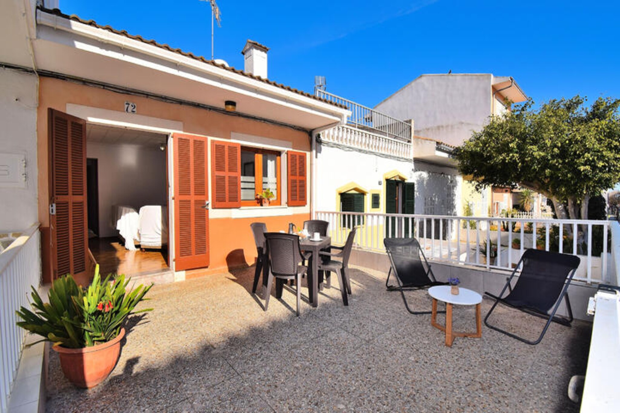Experience the charm of coastal living in this spacious holiday home in the heart of Can Picafort, a vibrant seaside destination in Mallorca. Just a short stroll from the golden sands and crystal-clear waters, this property offers the perfect retreat for families or friends seeking both relaxation and adventure. The lively atmosphere of Can Picafort, with its bustling promenade, local shops, and diverse dining options, sets the stage for an unforgettable island getaway. \n\nThis 125 m² home comfortably accommodates up to four guests, featuring two cozy bedrooms, each equipped with two single beds, and a well-appointed bathroom with a bathtub. An additional bathroom with a shower is conveniently located in the adjoining garage, which also provides parking for one car. The air-conditioned living room invites you to unwind on the comfortable sofa, while the dining area, with seating for six, is perfect for shared meals. The fully equipped kitchen makes preparing delicious Mediterranean dishes a breeze, and satellite TV and Wi-Fi ensure modern comforts throughout your stay. \n\nStep out onto the expansive 20 m² terrace, where garden furniture awaits for al fresco dining or simply soaking in the warm Mediterranean evenings. The proximity to the beach and local amenities means you can easily enjoy the best of Can Picafort, from sunbathing and watersports to exploring the vibrant local culture and cuisine. \n\nWhether you're looking to relax by the sea, explore Mallorca's natural beauty, or immerse yourself in the lively energy of Can Picafort, this holiday home offers the ideal base for your next adventure. Book your stay today and create lasting memories by the Mediterranean coast.