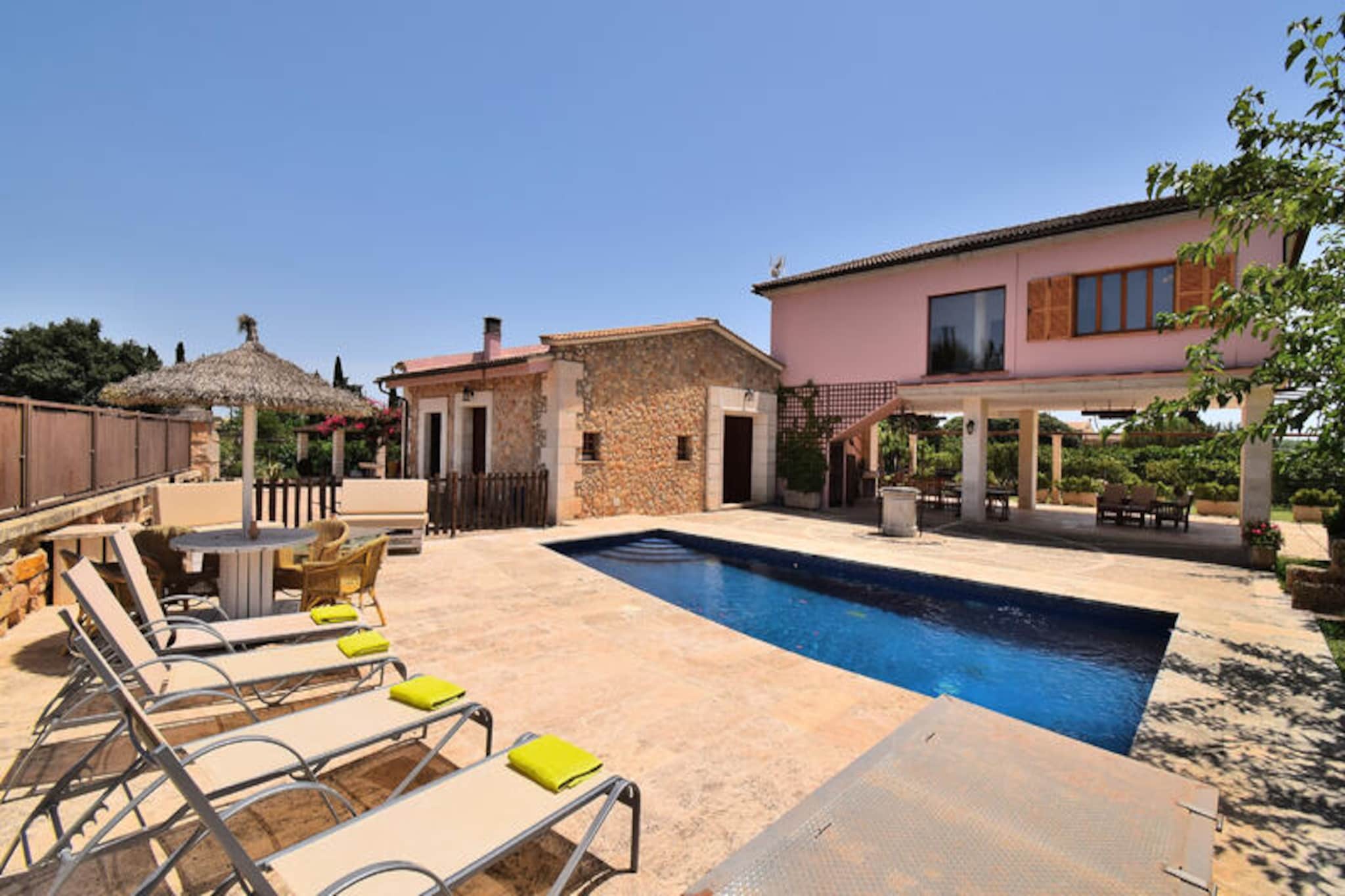 In the heart of Mallorca’s serene countryside, this inviting villa in Muro offers a tranquil retreat for families and friends. Surrounded by lush gardens and with stunning views of the nearby mountains, the property exudes a peaceful charm that perfectly complements its rural setting. Whether you’re sipping your morning coffee on the expansive terrace or taking a refreshing dip in the private pool, every moment here feels like a step closer to nature’s embrace. The villa’s location, just a short drive from the picturesque village of Muro, allows you to enjoy the best of both worlds: quiet seclusion and easy access to local culture and amenities. \n\nSpanning 280 m², the villa comfortably accommodates up to six guests across three spacious bedrooms, each equipped with air conditioning for your comfort. The interior blends modern convenience with cozy touches, featuring a fully equipped gas-powered kitchen, a welcoming living area with a fireplace, and two well-appointed bathrooms. The outdoor space is equally impressive, boasting a 300 m² terrace, a fenced garden, and a barbecue area perfect for al fresco dining. Families will appreciate the children’s play area, while amenities like Wi-Fi, satellite TV, and private parking ensure a hassle-free stay. \n\nLocated just 16 km from the sandy shores of Can Picafort and 19 km from the stunning Parc Natural de S'Albufera, the villa is ideally situated for exploring Mallorca’s natural beauty. Golf enthusiasts can tee off at Golf Alcanada, just 28 km away, while those seeking adventure can visit the nearby Hidropark Alcúdia or enjoy hiking and cycling in the surrounding countryside. The charming streets of Muro, with their traditional Mallorcan architecture and local dining options, are just 3 km away, offering a glimpse into the island’s rich heritage. \n\nThis villa is more than just a place to stay; it’s a gateway to the authentic Mallorcan experience. Whether you’re here to relax by the pool, explore the island’s breathtaking landscapes, or immerse yourself in local culture, this property provides the perfect base for an unforgettable holiday.