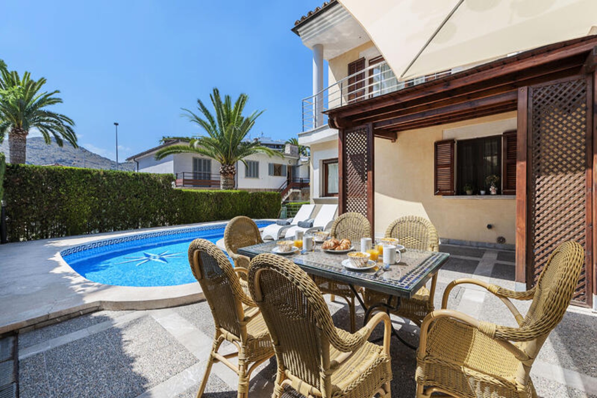 The elegant villa "Northern Star" is a holiday gem located in the sought-after area of Puerto Alcudia, in northern Mallorca, just 80 meters from the soft sands of Alcudia Bay. Sleeping up to 9 people, this holiday home features a spacious living room, a fully equipped kitchen, 4 bedrooms, and 4 bathrooms.
Amenities include Wi-Fi, air conditioning, a television, a washing machine, a dryer, a cot, and a high chair. The covered terrace invites you to enjoy al fresco dining, while another space is furnished as a cozy lounge, perfect for relaxing. A garage for three vehicles is also available, and linens and towels are included in the price.
The outdoor area offers a swimming pool for a refreshing dip, sun loungers to soak up the warm Majorcan sun, as well as a ping-pong table and a pool table for family fun. The beach is just a short walk away, and numerous restaurants and bars offering local cuisine are within a kilometer.
The property is conveniently located approximately 500 meters from the nearest supermarket. The island's capital, Palma, is approximately a 45-minute drive (60 km).
Enjoy an unforgettable holiday in the splendid villa "Northern Star"
IMPORTANT:
- All additional payments and online registration procedures are handled via WhatsApp, outside of the platform.
- All guests over 16 years of age staying in the holiday homes must pay the tourist tax. Some portals do not charge the tourist tax; in this case, you will receive a separate message to make this payment.
- Hot/cold air conditioning included up to 300 kWh per week
- A refundable security deposit will be charged.
- Parties are not allowed. - To comply with the law, identification is required from all guests before entering the house.
- Please note that the gardener accesses the grounds once or several times a week for garden and pool maintenance.
Port d'Alcúdia, located on the northeast coast of the beautiful island of Mallorca, is a destination that perfectly combines the authenticity of an old fishing village with the vibrancy of a modern and dynamic place.
Its beaches are a true paradise: white sands and crystal-clear waters that invite relaxation and enjoyment. The famous Alcúdia Beach is a magnet for sun and sea lovers, offering ample space for sunbathing, swimming, or participating in a wide range of exciting water sports.
The seafront promenade is a bustling epicenter of activity, full of charm and energy. The streets around the port are lined with restaurants serving local and international culinary delights, as well as boutiques offering everything from souvenirs to cutting-edge fashion.
In addition to being a perfect place to relax and enjoy panoramic views of the Mediterranean Sea, the Port of Alcúdia is an ideal starting point for exploring the region's rich history and culture. Its surroundings offer opportunities for cruises, visits to nearby archaeological sites, and a diverse range of outdoor activities to suit all tastes.
In short, the authentic charm, natural beauty, and diverse experiences make Port d'Alcúdia an unmissable destination for those looking to combine relaxation, entertainment, and a touch of adventure on the wonderful island of Mallorca.
Additional services payable locally:
Security deposit (refundable) €300.00 per booking