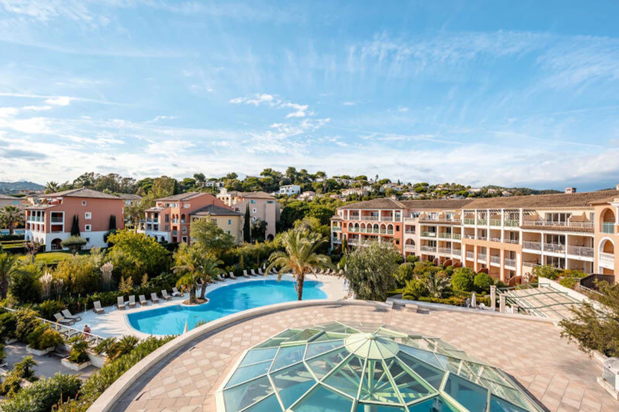 Where the azure waters of the Bay of Saint-Tropez meet the charm of the French Riviera, this elegant holiday apartment offers a serene escape in the heart of Les Calanques des Issambres. Imagine waking up to the gentle sea breeze, stepping onto your private terrace, and gazing out at the shimmering waves and lush gardens that surround the residence. The Mediterranean’s timeless allure is yours to savor, just 100 meters from the beach and steps from the vibrant village center. \n\nLocated on the 3rd floor, this bright and airy apartment is designed for relaxation and convenience. The living room features two comfortable sofa beds, while the bedroom boasts a cozy double bed, making it ideal for couples or small families. The fully equipped kitchen invites you to prepare fresh meals, while the terrace provides the perfect setting for al fresco dining with stunning views of the sea and the residence’s expansive seawater swimming pool. Modern amenities such as Wi-Fi, private outdoor parking, and included linens ensure a stress-free stay. \n\nBeyond the residence, indulge in the nearby Thalgo® thalassotherapy center for rejuvenating treatments or explore local activities like golf and scuba diving. The children’s playground and proximity to shops and restaurants make this location perfect for families seeking both adventure and relaxation. From April to October, the 300 m² seawater pool becomes a haven for sun-soaked afternoons. \n\nWhether you’re strolling through the leafy gardens, basking in the sun on the beach, or exploring the iconic Bay of Saint-Tropez, this apartment offers the quintessential Riviera experience. Let the beauty of the Mediterranean and the comforts of Les Calanques des Issambres create unforgettable memories for your next holiday.