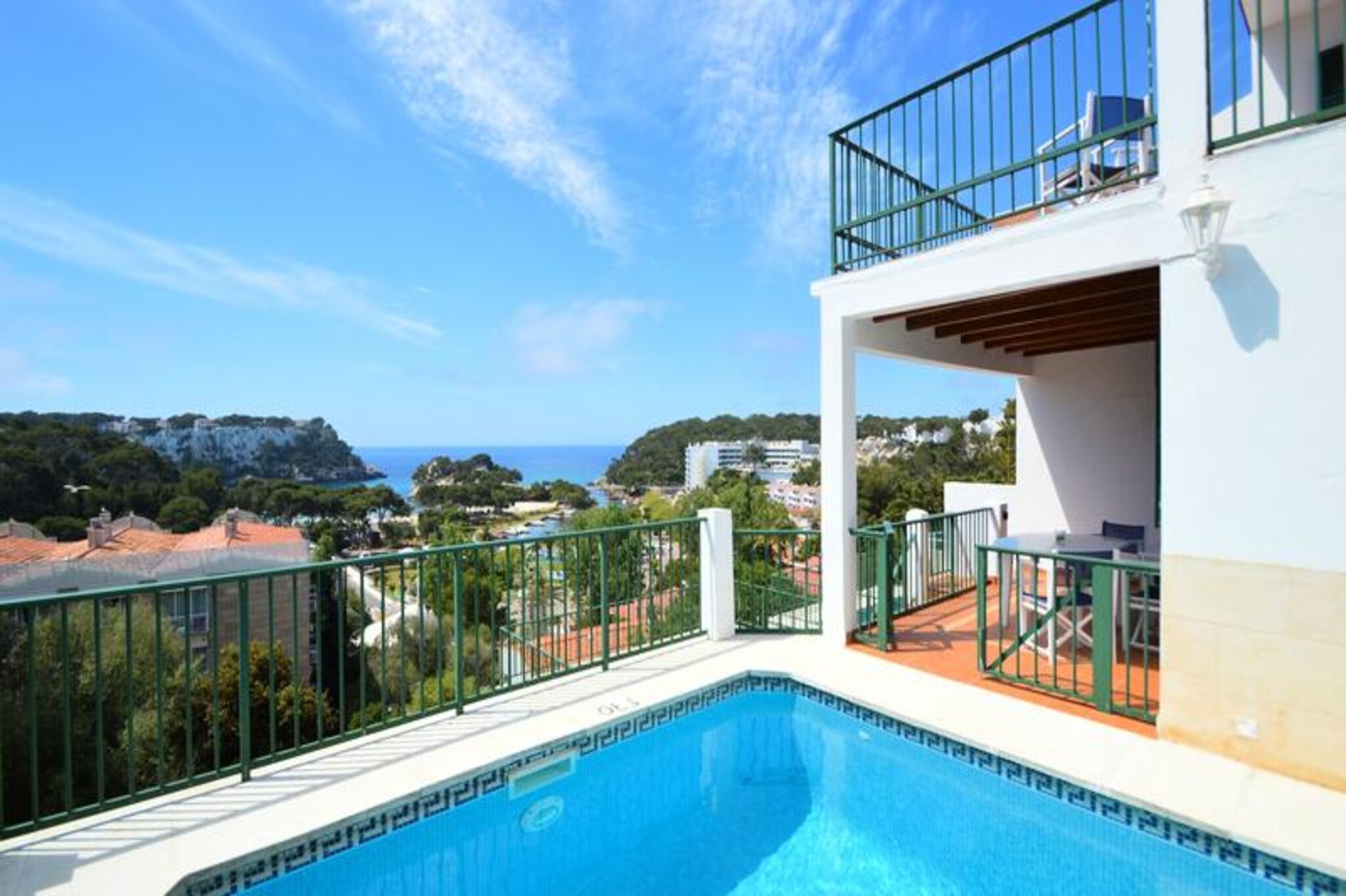 Imagine waking up to the gentle sound of waves and stepping out onto your private balcony to take in panoramic views of the turquoise waters of Cala Galdana. Casa Cris is a charming duplex that combines modern comfort with the natural beauty of Menorca. Just a minute’s walk from the beach and the lively shopping area, this property offers the perfect balance of relaxation and convenience for your holiday escape. Whether you’re lounging by your private pool or enjoying a barbecue on the terrace, every moment here feels like a slice of paradise. 
 
 The duplex is thoughtfully designed to accommodate up to four guests. The upper floor features a serene double bedroom with a private balcony overlooking the bay, a twin bedroom with fitted wardrobes, and a family bathroom with a bathtub and hairdryer. On the ground floor, the spacious living room invites you to unwind with its cozy sofas, dining area, and direct access to the pool. The fully equipped kitchen, complete with a hob, oven, microwave, and more, ensures you have everything you need to prepare delicious meals. For added comfort, the property includes air conditioning and WiFi throughout. 
 
 Cala Galdana is renowned for its pristine beach, framed by dramatic cliffs and offering crystal-clear waters perfect for swimming or kayaking. The area is family-friendly and provides a variety of amenities, including restaurants, shops, and water sports. Nature lovers will appreciate the nearby walking trails, such as the scenic Cami de Cavalls, leading to unspoiled beaches like Cala Mitjana and Cala Macarella. With a bus stop just three minutes away, exploring the island is effortless, though a rental car is recommended for discovering Menorca’s hidden gems. 
 
 Casa Cris invites you to create unforgettable memories in one of Menorca’s most picturesque settings. Whether you’re seeking adventure or tranquility, this property is your gateway to an extraordinary island experience.