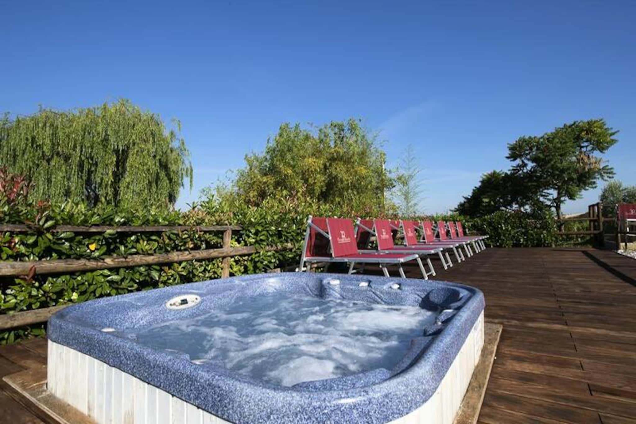 Amidst the rolling hills of Tuscany, just 2 km from the picturesque village of Montespertoli, lies the enchanting Borgo Filicardo Residence. This sprawling 140-hectare wine estate, with 47 hectares dedicated to lush vineyards, offers a serene retreat where the essence of Italian countryside living comes alive. With Florence and San Gimignano only a 20-minute drive away, you’ll find the perfect balance between tranquil seclusion and cultural exploration. 
 
 The Residence boasts 16 spacious, air-conditioned apartments, each with a private terrace and barbecue, inviting you to savor alfresco meals under the Tuscan sun. Inside, the apartments are thoughtfully designed, featuring a cozy living room with a sofa bed, a fully equipped kitchen, and a bedroom with a double and single bed. Modern comforts such as WiFi, television, and air conditioning ensure a relaxing stay. Just 10 meters from your doorstep, the sparkling outdoor pool with a hot tub awaits, open from April to September, offering a refreshing escape on warm days. 
 
 Beyond the comforts of your apartment, the estate provides an array of amenities, including a pétanque court, laundry facilities, and complimentary parking. A highlight of your stay will undoubtedly be the weekly wine tasting sessions, where you can indulge in the estate’s finest creations and immerse yourself in the rich winemaking heritage of the region. 
 
 Whether you’re exploring the nearby medieval towns, strolling through the vineyards, or simply unwinding by the pool, Borgo Filicardo Residence is a haven of relaxation and authentic Tuscan charm. Perfect for couples, families, and even your furry friends, this is a destination where unforgettable memories are made.