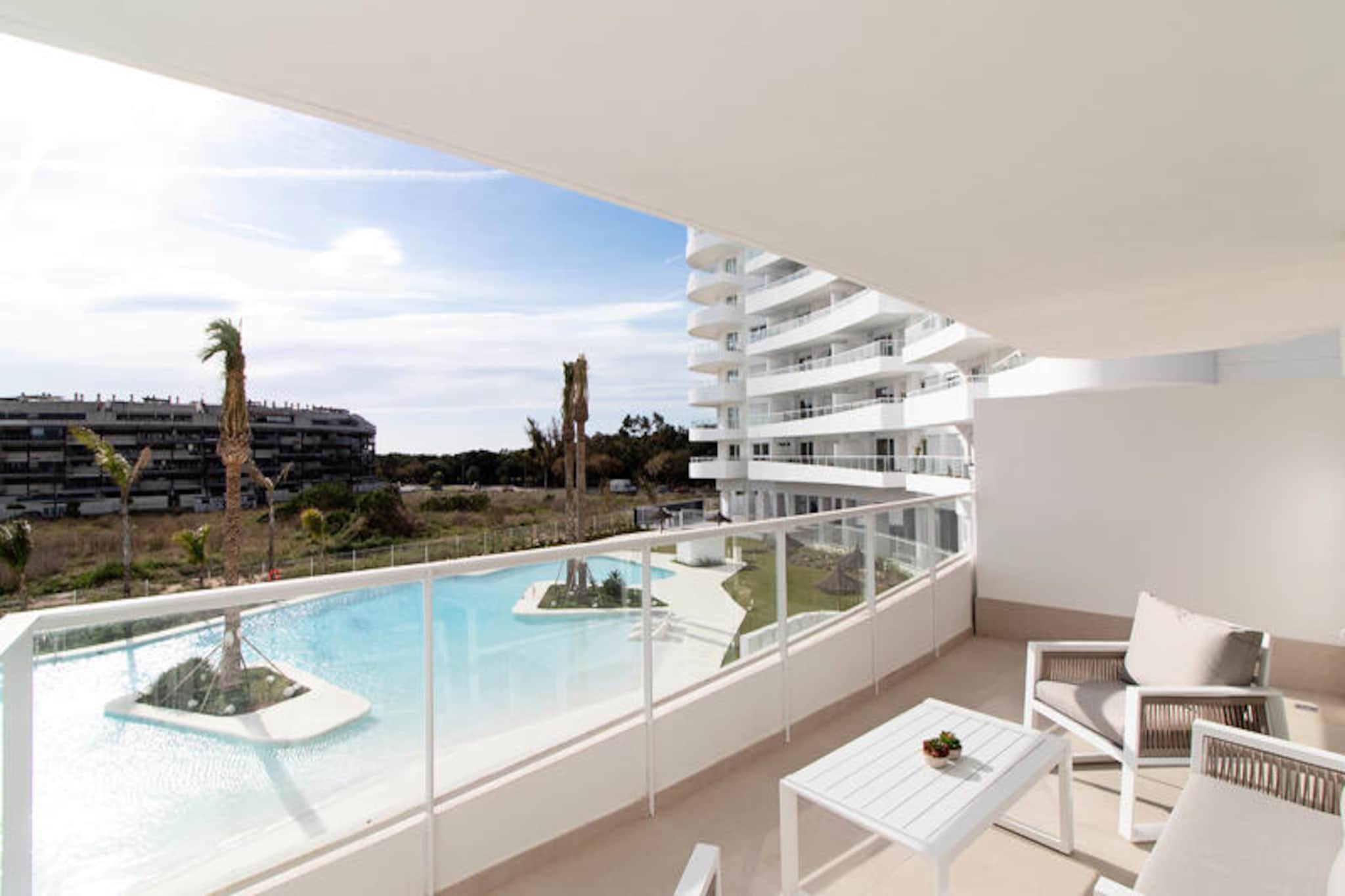 Imagine waking up to the gentle sound of waves and the warm Mediterranean sun streaming through your window. This modern apartment in the exclusive Gran Canet residential area offers the perfect retreat for those seeking relaxation and seaside bliss. With over 7,600 m² of communal spaces and 800 m² of swimming pools, this resort is a haven for both families and couples looking to unwind and recharge. 
 
 The apartment boasts a spacious terrace overlooking the pool, ideal for morning coffees or evening gatherings with loved ones. Inside, you'll find two bright bedrooms, two bathrooms, and an open-plan kitchen and living area that seamlessly connects to the terrace. Fully equipped with all the comforts of home, this property ensures a carefree and enjoyable stay. The resort features a large swimming pool with beach access, a children's pool, a sun deck, lush green spaces, a gym, a spa with a sauna, paddle tennis courts, and other sports facilities to keep you entertained throughout your stay. 
 
 Just a short stroll away, Canet d'en Berenguer beach awaits, renowned for its fine golden sand, crystal-clear waters, and excellent amenities. Named the best beach in Spain in 2018, it offers activities for all ages, including a summer cinema, sports, and local markets. The nearby town is brimming with charming restaurants, cafes, and shops, while a large park with gardens and playgrounds provides additional leisure options. 
 
 Whether you're here to relax by the pool, explore the vibrant local culture, or enjoy the pristine beach, this property offers everything you need for an unforgettable Mediterranean getaway.
