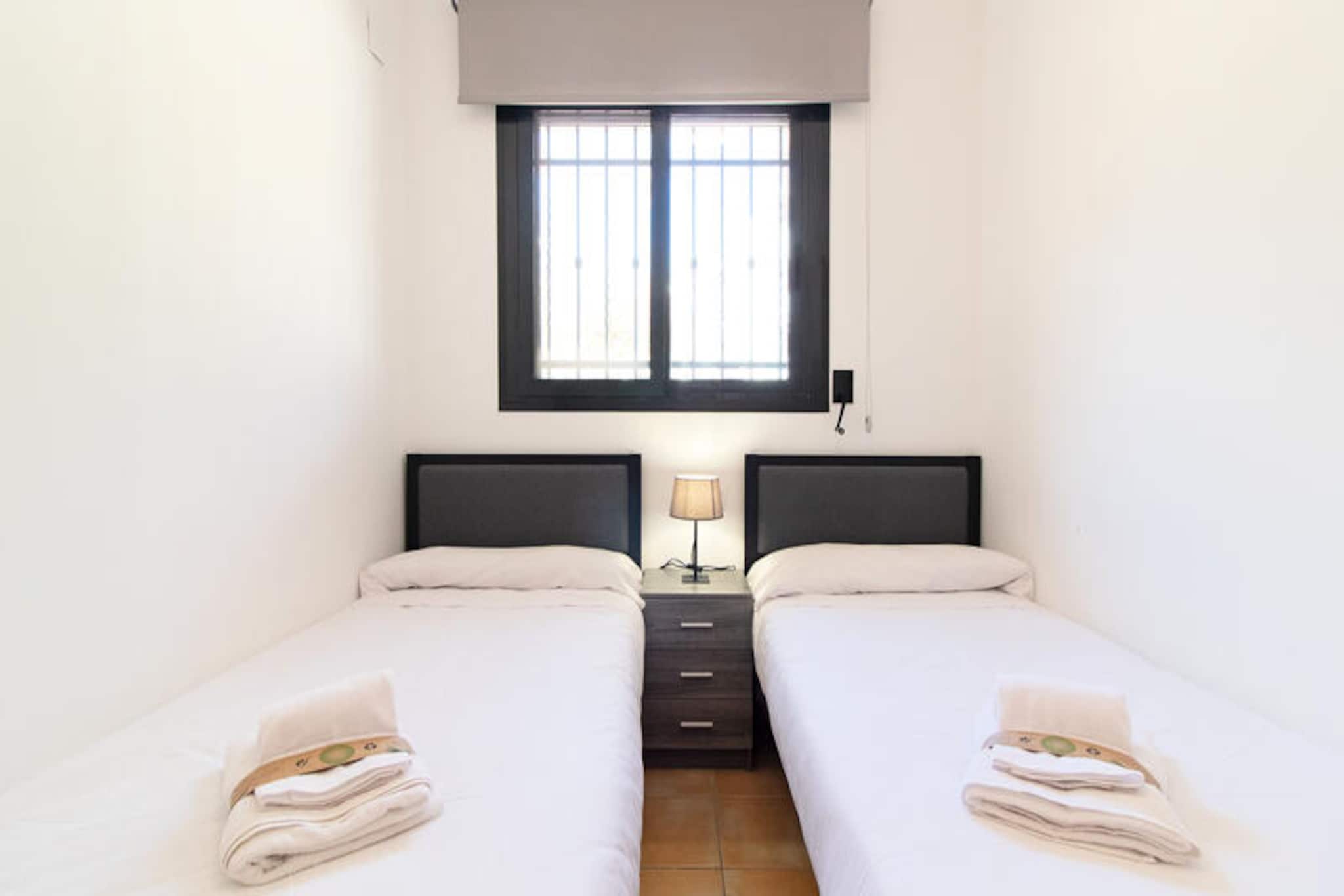 In the sun-drenched coastal town of Canet d'en Berenguer, this modern apartment offers a serene escape just moments from the Mediterranean Sea. With its spacious design and thoughtful amenities, it’s the perfect retreat for families or couples seeking relaxation and adventure in equal measure. Imagine waking up to the gentle sea breeze, enjoying your morning coffee on the expansive 70 m² terrace, and planning a day filled with beachside bliss or exploring the vibrant local culture. 
 
 The apartment features two comfortable bedrooms and accommodates up to four guests. Designed for both comfort and convenience, it boasts air conditioning in the living room and some bedrooms, heat pump heating, and mosquito nets throughout. The fully equipped kitchen includes a ceramic cooktop, refrigerator, microwave, oven, dishwasher, and more, making it easy to prepare meals with fresh local ingredients. Additional amenities such as Wi-Fi, a washing machine, an iron, and a television ensure a stress-free stay. The property also includes a shared swimming pool with a children's area, a paddle tennis court, a play area for kids, and a private garage for added convenience.
 
 Canet d'en Berenguer is celebrated for its pristine beaches, charming promenades, and lively markets. Whether you’re lounging by the pool, strolling along the golden sands, or sampling local delicacies at nearby restaurants, this location offers something for everyone. For those seeking adventure, the surrounding area provides opportunities for water sports, hiking, and cultural excursions.
 
 This apartment is more than just a place to stay; it’s a gateway to unforgettable memories on Spain’s stunning coastline. Whether you’re here to unwind or explore, this property promises a holiday filled with comfort, beauty, and endless possibilities.