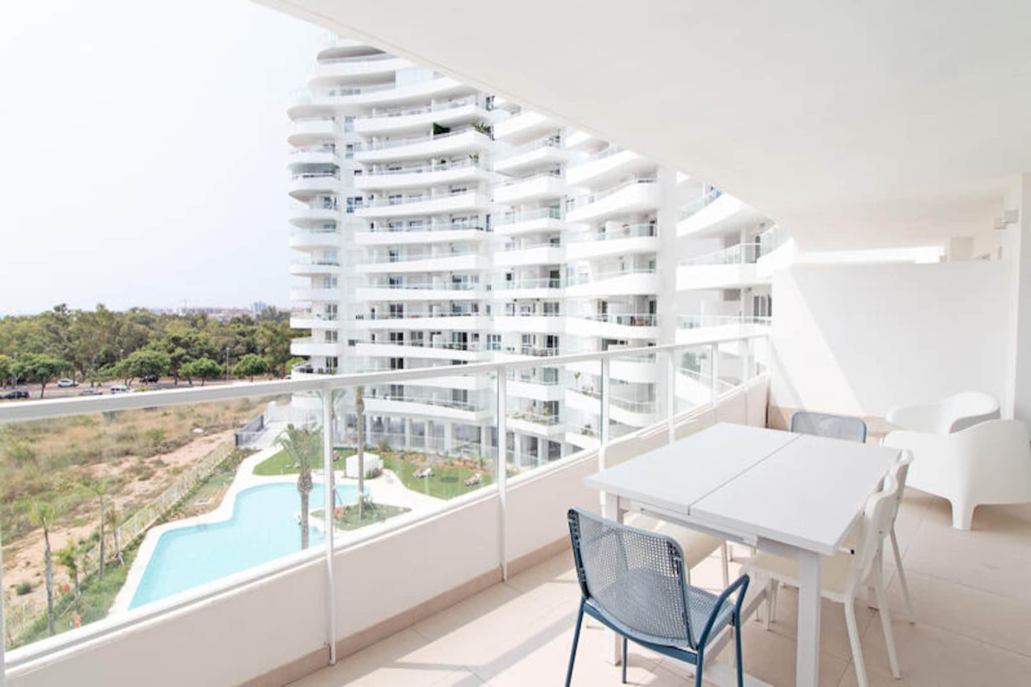 Imagine waking up to the soothing sound of waves and stepping out onto a spacious terrace with breathtaking views of the Mediterranean coast. This modern apartment, located on the stunning Canet d'En Berenguer beach, offers the perfect setting for a relaxing seaside getaway. Whether you're savoring the sunshine or enjoying the gentle sea breeze, this property invites you to immerse yourself in the beauty of the Valencian coastline. 
 
 The apartment is part of the exclusive Gran Canet residential area, boasting over 7,600 m² of communal spaces designed for leisure and relaxation. Dive into the large swimming pool with beach access, unwind on the sun deck, or let the kids splash around in the children's pool and playground. For those seeking an active lifestyle, the complex features a gym, paddle tennis courts, and a spa complete with a sauna. Every detail has been crafted to ensure your stay is as comfortable as it is memorable. 
 
 Inside, the apartment is filled with natural light, thanks to its open layout and large windows. The stylishly decorated interior includes three bedrooms, two of which open onto the terrace, two modern bathrooms, and a fully equipped kitchen that flows seamlessly into the living area. The expansive terrace is the ideal spot for family gatherings or quiet evenings under the stars. 
 
 Canet d'En Berenguer is a vibrant destination with something for everyone. Explore its charming restaurants, cafes, and shops, or enjoy the lively summer activities, including beach cinema, sports, and local markets. The beach itself, awarded the title of Spain's best beach in 2018, offers over 2,100 meters of soft sand, crystal-clear waters, and full accessibility for all visitors. With its unbeatable location and exceptional amenities, this apartment is your gateway to an unforgettable Mediterranean escape.