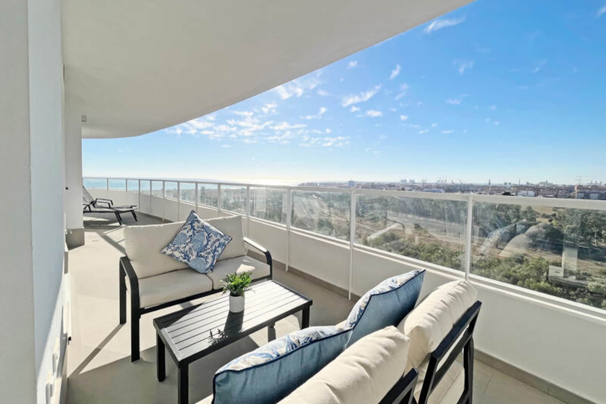 Imagine waking up to the gentle Mediterranean breeze and the golden hues of the Spanish sun streaming onto your private terrace. This modern and spacious apartment in Canet d'en Berenguer offers the perfect blend of comfort and leisure, making it an ideal retreat for families or small groups of up to five guests. With its contemporary design and thoughtful amenities, this property promises a memorable stay just moments from the beach. 
 
 Spanning 143 m², the apartment boasts two cozy bedrooms, a fully equipped American-style kitchen with a ceramic hob, and a bright living area that opens onto a balcony. Whether you're preparing a meal with fresh local ingredients or unwinding in the air-conditioned comfort, every detail has been designed for your convenience. The property also features two televisions, Wi-Fi, a washing machine, dryer, and even a hairdryer. For added luxury, enjoy access to a communal swimming pool, including a children's pool, a paddle tennis court, a gym, and a spa. A secure garage within the building ensures peace of mind for those traveling by car. 
 
 Located in the charming coastal town of Canet d'en Berenguer, this apartment places you close to pristine beaches, vibrant local markets, and a variety of dining options. Explore the nearby marina, take a leisurely stroll along the promenade, or indulge in water sports under the warm Spanish sun. For those seeking cultural adventures, the historic city of Valencia is just a short drive away, offering world-class museums, stunning architecture, and a lively atmosphere. 
 
 Whether you're looking to relax by the pool, enjoy family time at the beach, or explore the rich culture of the region, this apartment is your gateway to an unforgettable Mediterranean escape.