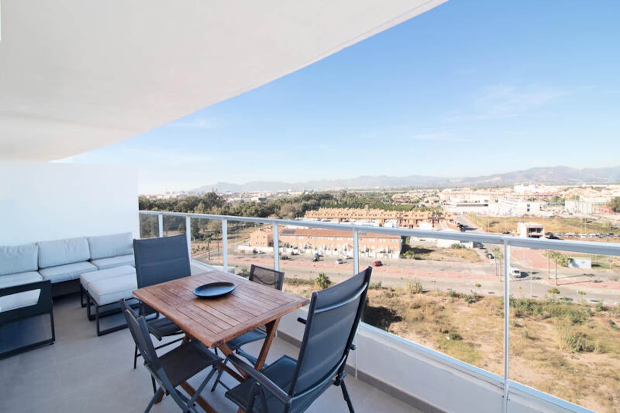 In the charming coastal town of Canet d'en Berenguer, this modern apartment offers a serene retreat just moments from the Mediterranean Sea. Imagine waking up to the gentle sea breeze, enjoying your morning coffee on the private balcony, and planning your day of relaxation or adventure in this sunny Spanish paradise. With its contemporary design and thoughtful amenities, this property is perfect for couples or small families seeking comfort and convenience. 
 
 The apartment spans 60 m² and features one cozy bedroom, comfortably accommodating up to four guests. The open-plan kitchen is fully equipped with a ceramic hob, refrigerator, microwave, oven, freezer, dishwasher, and all the utensils you need to prepare delicious meals. The living area includes two TVs and Wi-Fi, ensuring entertainment for everyone. Air conditioning throughout the apartment guarantees a pleasant stay, even during the warmest months. Additional conveniences such as a washing machine, iron, and hairdryer make it feel like a home away from home. Guests also have access to a paddle tennis court, a gym, a spa, and a children's play area, making it a fantastic choice for active and leisurely holidays alike. Covered parking in the same building adds to the ease of your stay. 
 
 Canet d'en Berenguer is renowned for its pristine beaches, vibrant local culture, and proximity to Valencia, just a short drive away. Spend your days exploring the golden sands, indulging in fresh seafood at nearby restaurants, or discovering the historic charm of Valencia's old town. Whether you’re here to unwind or explore, this apartment places you at the heart of it all. Book your stay and create unforgettable memories in this idyllic Mediterranean haven.
