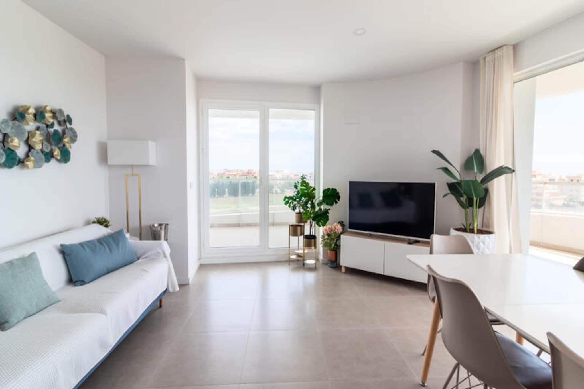 Imagine waking up to the gentle sound of waves and stepping out onto your private terrace to take in the breathtaking views of the Mediterranean Sea. This stunning apartment in the exclusive Gran Canet residential complex offers the perfect setting for a relaxing seaside escape. Located just steps from the award-winning Canet d'en Berenguer beach, this is your gateway to one of Spain's most pristine coastal destinations. 
 
 The apartment is thoughtfully designed to accommodate up to seven guests, featuring three spacious bedrooms, two modern bathrooms, and an open-plan kitchen and living area that seamlessly extends onto a magnificent terrace. The second terrace provides an additional space to unwind or enjoy meals with family and friends. Bright, airy, and fully equipped, the property ensures a comfortable stay with all the amenities you need to feel at home. 
 
 Gran Canet is more than just a residence; it’s a lifestyle. With over 7,600 m² of communal areas, including lush green spaces, an expansive swimming pool with beach access, a children’s pool and playground, a gym, a spa with a sauna, and paddle tennis courts, there’s something for everyone. Whether you’re soaking up the sun on the sundeck or enjoying a refreshing swim, relaxation is guaranteed. 
 
 Canet d'en Berenguer itself is a vibrant seaside town offering a variety of restaurants, cafes, and shops. The beach, recognized as Spain’s best in 2018, boasts fine golden sand, crystal-clear waters, and excellent facilities, including accessibility for all. From summer fairs and open-air cinemas to weekly markets and sports activities, there’s always something happening here. Combine the charm of the Mediterranean with the luxury of Gran Canet, and you have the ultimate holiday retreat.