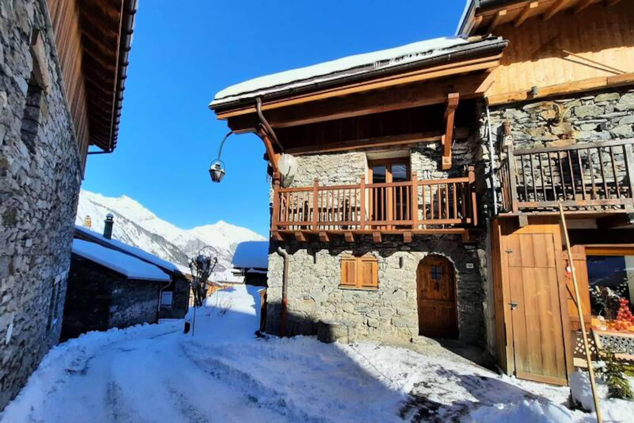 In the heart of the picturesque Saint Martin de Belleville, this charming semi-detached stone and wood chalet offers a perfect blend of alpine tradition and modern comfort. Just a short stroll from the village center, it places you within easy reach of ski slopes, shops, restaurants, and essential services like the ski school and daycare. With the village center ski lift only 150 meters away, your mountain adventures begin right at your doorstep. The south-facing balcony and private garden provide serene spaces to soak in the breathtaking views of the Belleville Valley, making every moment unforgettable.
This cozy triplex chalet spans three levels and comfortably accommodates 4 to 5 guests. The ground floor welcomes you with a warm entrance equipped with ski and boot storage, leading to a spacious double bedroom and a bathroom featuring a bathtub and washing machine/dryer. Ascend to the first floor, where an open-plan kitchen and living area await, complete with modern appliances such as a ceramic hob, oven, microwave, and even a crepe maker for a true French culinary experience. The living room, with its plush sofa, armchairs, and entertainment system, opens onto a balcony perfect for morning coffee or evening relaxation. The top floor features a second double bedroom, an alcove with a single bed, and an additional bathroom with a shower.
Saint Martin de Belleville is a gateway to the renowned Three Valleys ski area, offering endless opportunities for skiing, snowboarding, and hiking. After a day on the slopes, explore the village’s charming streets lined with traditional chalets, gourmet restaurants, and local shops. Whether you’re enjoying the winter snow or the vibrant summer landscapes, this chalet is your ideal retreat for a memorable alpine escape. With thoughtful amenities like free Wi-Fi, beds made upon arrival, and end-of-stay cleaning included during the winter season, every detail is designed to ensure your comfort. Discover the magic of the French Alps at Chalet L'Escarel, where relaxation and adventure come together seamlessly.