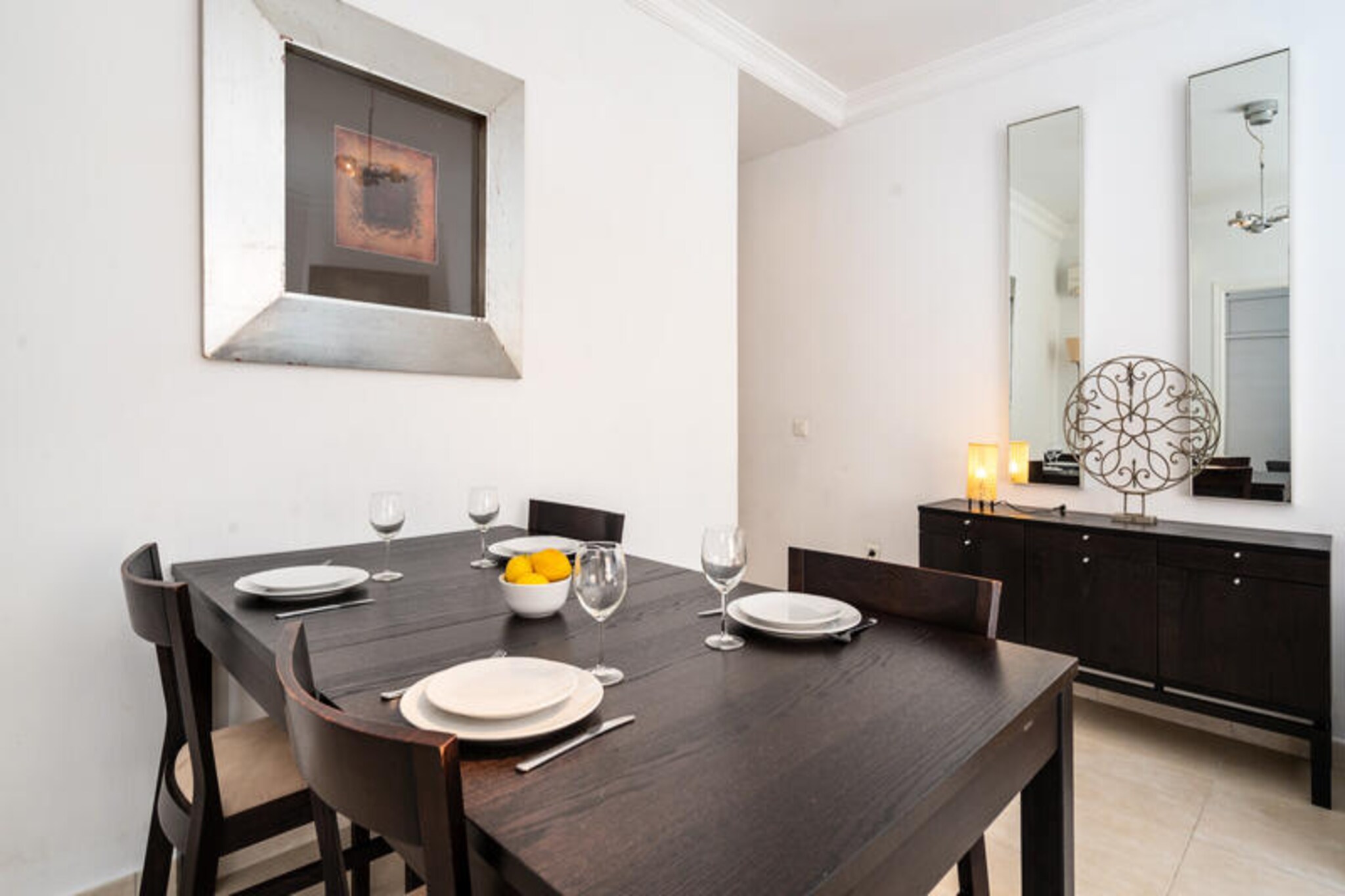 In the heart of San Luis de Sabinillas, where the Mediterranean breeze mingles with the charm of Andalusian life, this bright and welcoming apartment offers a serene retreat for families and couples alike. Imagine waking up to the gentle sound of waves and stepping onto your private balcony to soak in the vibrant coastal atmosphere. With its ideal location just steps from local cafés, restaurants, and the sandy shores of Playa Sabinillas, every moment here is infused with relaxation and discovery.
The apartment spans 93 m² and is thoughtfully designed to combine comfort and functionality. Featuring two cozy bedrooms, it comfortably accommodates up to four guests. The American-style kitchen is fully equipped with modern appliances, including a ceramic hob, dishwasher, and coffee maker, making it easy to prepare delicious meals. Additional amenities such as air conditioning, Wi-Fi, satellite TV, and a washing machine ensure a hassle-free stay, while the balcony invites you to unwind with a glass of local wine as the sun sets over the horizon.
Beyond the apartment, the area offers endless opportunities for exploration. Stroll to the nearby Lidl supermarket for fresh ingredients or enjoy a leisurely meal at one of the local restaurants. Golf enthusiasts will appreciate the proximity to Duquesa Golf Club, just 3 km away, while Malaga Airport, 100 km from the property, ensures convenient access for travelers. Whether you’re seeking sun-soaked days on the beach or cultural adventures in the nearby towns, this location is perfect for creating unforgettable memories.
Choose this apartment for its blend of modern comfort, prime location, and the irresistible allure of the Costa del Sol. Let the beauty of San Luis de Sabinillas be the backdrop to your next holiday adventure.