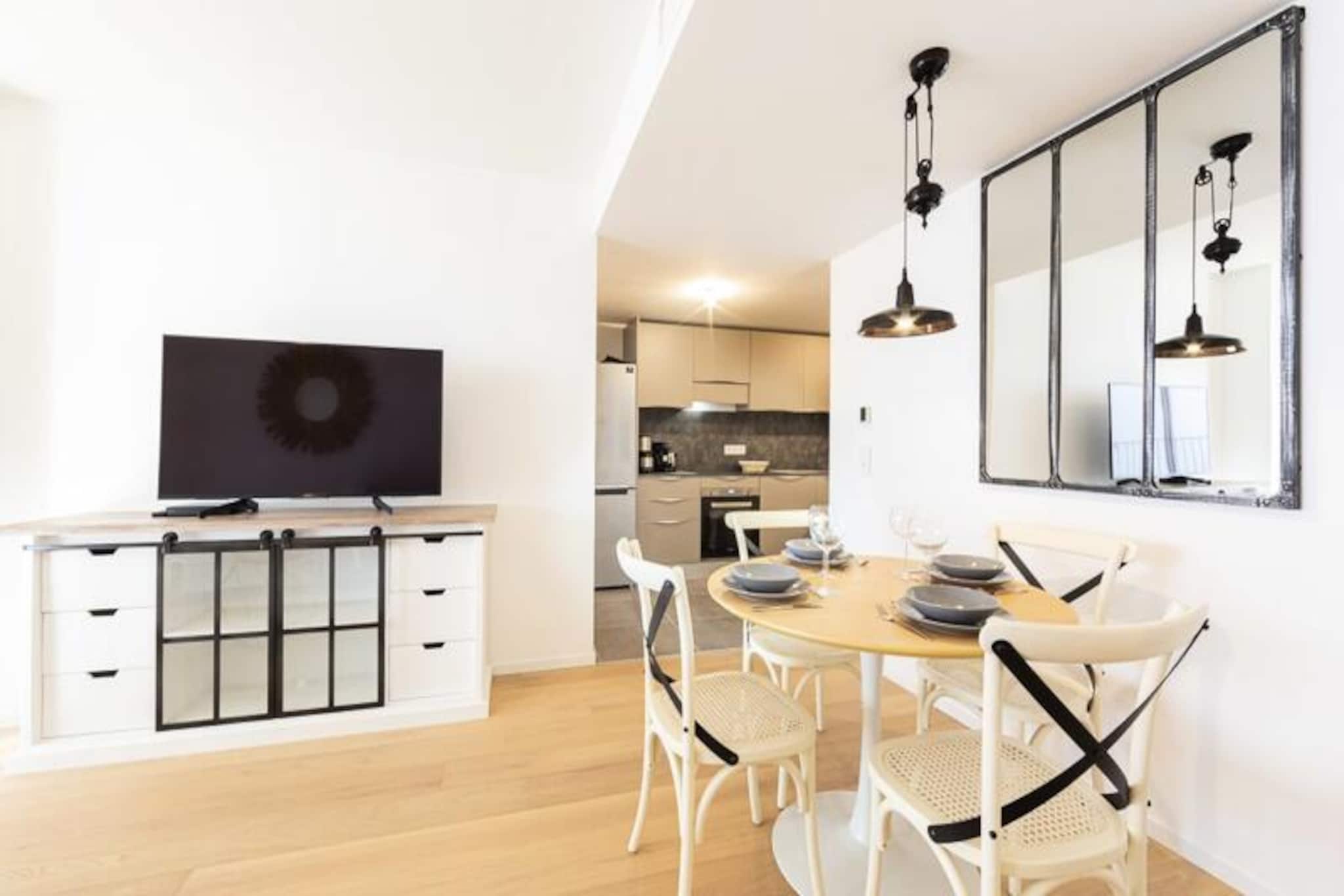 In the heart of Antibes, this luminous and spacious ground-floor apartment offers the perfect blend of modern comfort and coastal charm. Imagine waking up to the gentle Mediterranean breeze, stepping onto your private terrace overlooking a serene swimming pool, and enjoying a leisurely breakfast in the outdoor lounge area. Designed for relaxation and convenience, this residence is an oasis of tranquility just moments from the vibrant town center and the golden beaches of the French Riviera. 
 
 The apartment boasts a thoughtfully designed layout with two bedrooms, a fully equipped open-plan kitchen, and a cozy living room that seamlessly connects to the terrace. The master bedroom features a plush double bed and ample storage, while the second bedroom offers bunk beds, ideal for children. The sleek bathroom includes a walk-in shower and modern amenities. The kitchen is equipped with everything you need to prepare delicious meals, from a refrigerator and oven to a dishwasher and cooking utensils. The living room, with its dining and sitting areas, provides a comfortable space to unwind after a day of exploring. 
 
 Step outside, and you’ll find yourself in a peaceful residential neighborhood that offers the best of both worlds: a quiet retreat with direct access to the lively streets of Antibes. Nearby, you’ll discover charming bakeries, local markets, and a variety of restaurants. The train station and bus stop are just a short walk away, making it easy to explore the Côte d’Azur. Whether you’re visiting the historic old town, relaxing on the beach, or venturing to nearby Cannes or Nice, this location is ideal. 
 
 With air conditioning throughout, a double private parking space, and access to a pool open during the summer season, this apartment is the ultimate choice for a family getaway or a romantic escape. Let the charm of Antibes and the comfort of this modern residence create unforgettable memories on your next holiday.