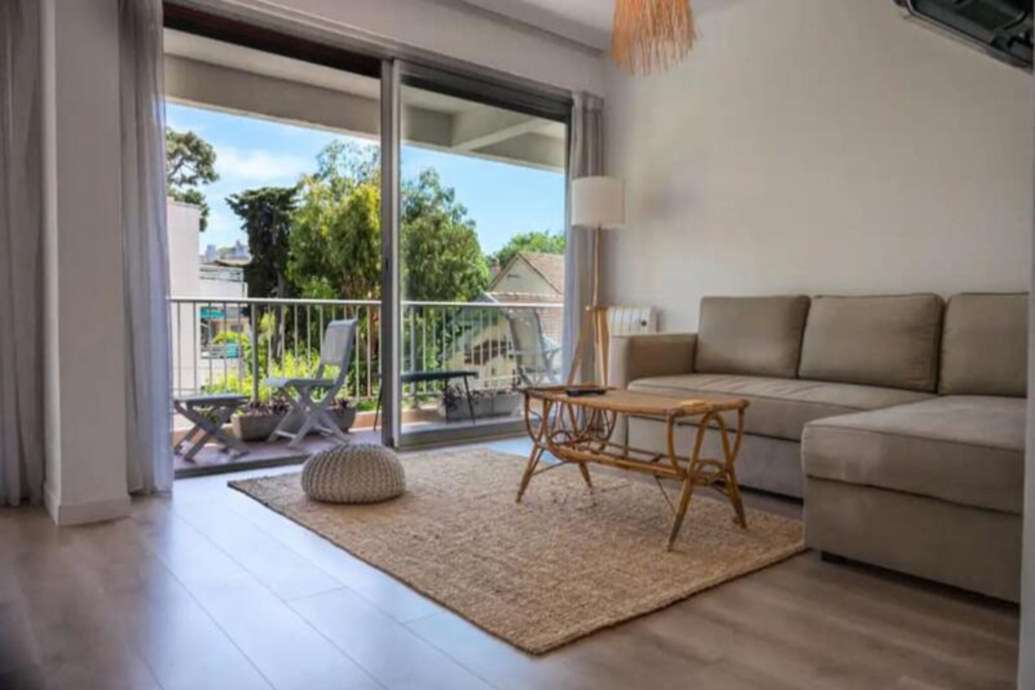 In the heart of Antibes, where the charm of the French Riviera meets the azure Mediterranean, this spacious 83 m² apartment offers a serene retreat just moments from the coastline. Imagine waking up to the gentle sea breeze, stepping out onto your 18 m² terrace with partial sea views, and enjoying your morning coffee as the sun rises over the horizon. Perfectly situated, this family-friendly apartment is a short stroll from the sandy shores of Ponteil Beach and Salis Beach, and within walking distance of the historic Old Town of Antibes, where cobblestone streets and vibrant markets await. 
 
 This thoughtfully designed apartment is located on the second floor of a secure building with an elevator. It features two comfortable bedrooms: one with a luxurious double bed and the other with two single beds and balcony access. The open-plan living room and fully equipped kitchen create a welcoming space for meals and relaxation, complete with a dining table for six, a sofa bed, and air conditioning. The modern bathroom includes a double vanity and a convenient laundry area, while a separate toilet adds extra comfort. The private terrace, accessible from both the living room and the second bedroom, is perfect for al fresco dining or simply soaking in the Mediterranean ambiance. 
 
 With an assigned parking space in the building’s courtyard, you can easily explore the surrounding area. A bakery, Italian restaurant, and supermarket are just steps away, while Antibes train station is a leisurely 24-minute walk. Whether you’re here to relax on the beaches, explore the cultural treasures of Old Antibes, or indulge in the culinary delights of the Côte d’Azur, this apartment offers the perfect base for an unforgettable stay. 
 
 Experience the magic of the French Riviera in this inviting home, where comfort, convenience, and coastal beauty combine to create the ultimate holiday escape.