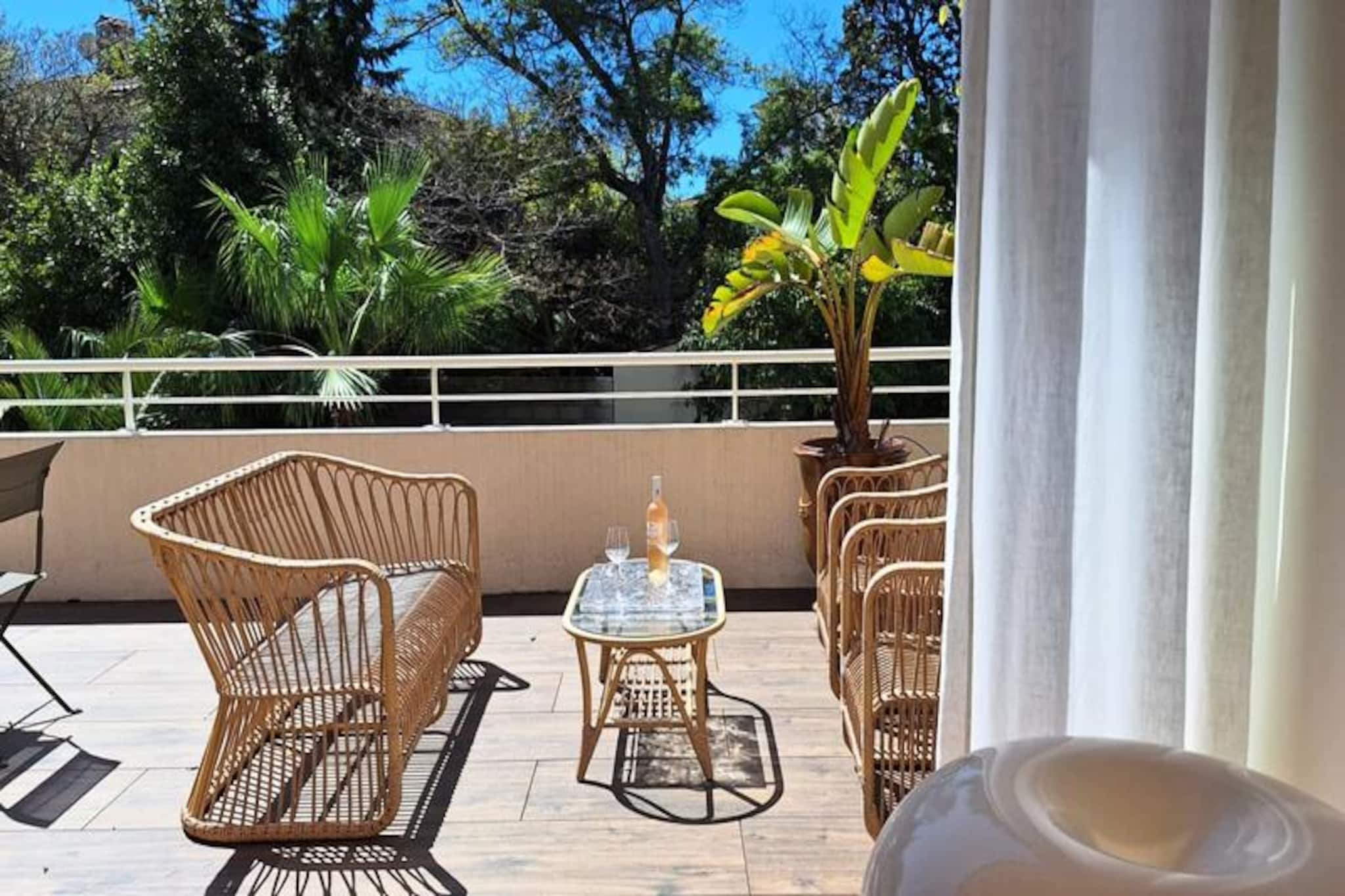 In the heart of the charming Antibes, this elegant 90 m² apartment offers a serene retreat with all the comforts of modern living. Whether you're visiting for business or leisure, this residence provides a perfect blend of relaxation and convenience. Imagine starting your mornings on one of the two spacious terraces, sipping coffee while overlooking the residence's inviting swimming pool, or enjoying the Mediterranean breeze in the privacy of this secure and tranquil setting. 

The apartment boasts a thoughtfully designed layout, featuring two bedrooms, two bathrooms, and a bright living and dining area that seamlessly connects to a fully equipped kitchen. The 35 m² terrace, accessible from the living room, is furnished with outdoor seating, making it an ideal spot for al fresco meals or unwinding after a day of exploration. The master bedroom offers a double bed, ample storage, and direct access to the terrace, while the second bedroom includes a sofa bed and opens onto a private 20 m² terrace with an outdoor dining table. Modern amenities such as central air conditioning, heating, internet access, and a utility room with a washing machine ensure a comfortable stay for all guests.

Perfectly situated, the apartment is just a ten-minute walk from Antibes train station and the 200 bus stop from Nice Airport, providing excellent connectivity. The neighborhood itself is peaceful and family-friendly, with a variety of local shops, including a butcher, baker, mini-market, and restaurants, all within easy reach. The historic old town of Antibes, with its cobblestone streets and vibrant markets, is also nearby, offering a delightful mix of culture and coastal charm.

Whether you're exploring the Côte d'Azur, relaxing by the pool, or savoring the local cuisine, this apartment is your gateway to an unforgettable stay in Antibes. With its prime location, modern amenities, and inviting atmosphere, it promises a holiday experience that combines comfort, style, and the allure of the French Riviera.