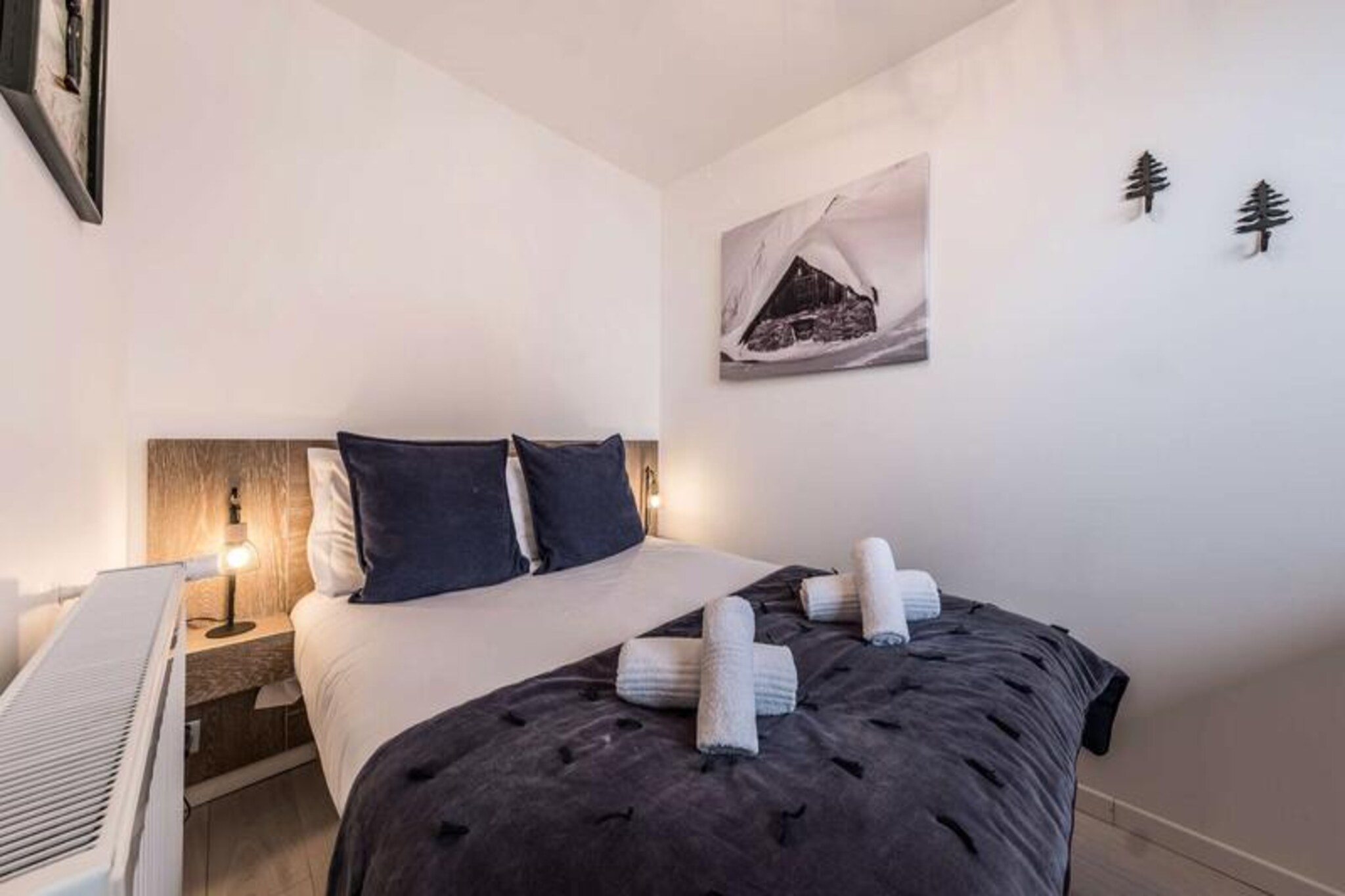 In the heart of Courchevel Moriond, this newly renovated south-facing apartment offers an idyllic mountain retreat with breathtaking views of the surrounding peaks. Imagine waking up to the golden morning light streaming through the windows, stepping onto your private terrace with a warm cup of coffee, and soaking in the serene alpine atmosphere. This ski-in/ski-out gem places you right at the doorstep of the Petit Moriond gondola, ensuring effortless access to the world-renowned slopes of the Trois Vallées ski area. Whether you're here for winter sports or summer hikes, this property is your gateway to unforgettable adventures.
The 40m² apartment is thoughtfully designed to accommodate up to four guests. The living area features a cozy lounge with a television and a double Murphy bed, seamlessly blending comfort and functionality. The fully equipped kitchen, complete with a kettle, oven, and filter coffee maker, opens to the main living space, making it perfect for preparing meals after a day on the slopes. A separate double bedroom with ample storage ensures restful nights, while the modern bathroom with a shower and separate WC adds convenience to your stay. Additional amenities include a ski locker, a private outdoor parking space, and a washing machine/dryer for your comfort.
Beyond the apartment, Courchevel Moriond offers a vibrant village atmosphere with charming restaurants, après-ski spots, and boutique shops just a short stroll away. The Ariondaz trail conveniently brings you back to your residence, making your ski days seamless and stress-free. For those seeking extra indulgence, our concierge service is at your disposal to arrange ski passes, lessons, equipment rentals, and even restaurant bookings.
Whether you're drawn by the allure of pristine slopes, the charm of the village, or the tranquility of the mountains, this apartment promises a memorable stay in the heart of the French Alps. Let the magic of Courchevel Moriond captivate you and create memories to last a lifetime.