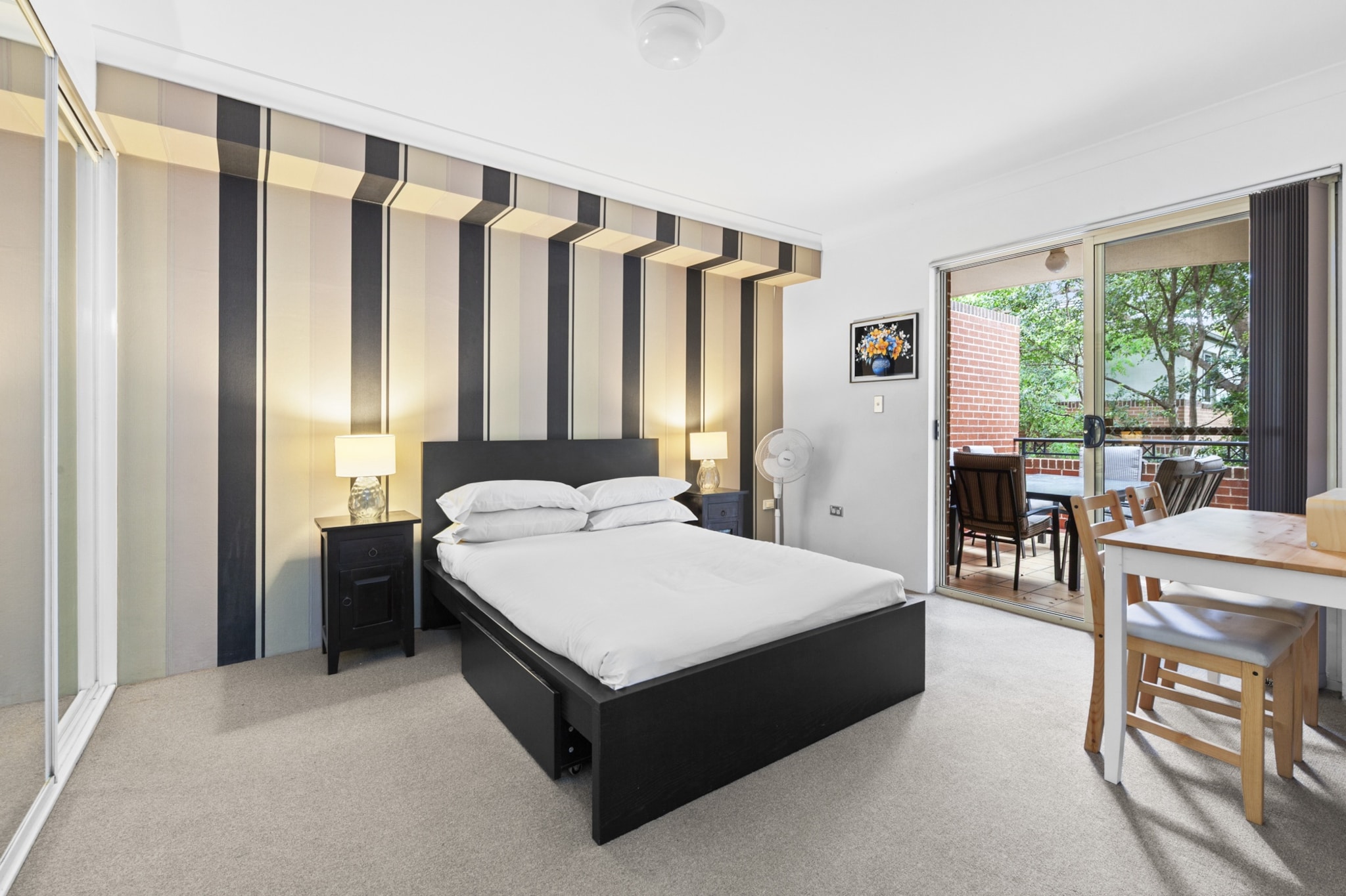 Property description
Set in Marrickvilleâ€™s vibrant Inner West, this two-bedroom apartment provides a peaceful base just moments from the Sydney CBD. Relax in the open-plan living area or step onto the balcony to enjoy some fresh air. The apartment offers seamless self-check-in and secure garage parking. Perfect for business trips or weekend getaways, it features a practical workspace and all the essentials for a comfortable stay.
The space
Sunlight streams into a warm, open-plan living area where a three-seater sofa invites you to unwind after a day out exploring. A tidy dining area for four sits beside a fully equipped kitchen featuring gas cooking, a dishwasher, and a coffee machine for easy mornings.
 
Both bedrooms are designed for rest, each offering a double bed, blackout blinds, and bedside lighting to ensure a good nightâ€™s sleep. The bathroom is fresh and functional, complete with a hairdryer. There are two dedicated workspacesâ€”one in a bedroom and one in the living roomâ€”ideal for remote or business travellers. Step outside to a private balcony furnished with outdoor seating and enjoy leafy views. For comfort, the living area includes split-system air conditioning.