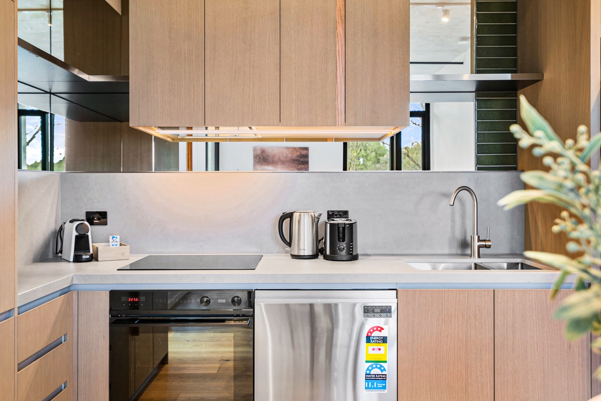 Property description
Experience Northcote in this brand-new 2-bedroom apartment featuring stylish finishes, a private balcony, and rooftop BBQ access. With secure parking, open-plan living, and a fully equipped kitchen, itâ€™s ideal for short or extended stays. Self-check-in is via Keynest once set up. Enjoy a peaceful, modern base just moments from local cafÃ©s and shops.
The space
This spacious lower ground apartment offers a seamless blend of modern design and home-like comfort. Step into a bright living area with wooden floors, an open living space, a Smart TV, and views to the Merri Creek. The open-plan layout flows into the dining area with seating for four, and a sleek, fully equipped kitchen complete with induction stovetop, electric oven, dishwasher, and coffee machine.
 
A private balcony with outdoor seating invites you to unwind in the fresh air, while rooftop access offers communal BBQ stationsâ€”perfect for enjoying Northcoteâ€™s sunset skyline. The in-unit laundry includes a washer-dryer combo. The apartment has access to a secure garage parking, lift access and wheelchair-friendly entry. Whether youâ€™re working remotely or relaxing, this home offers everything you need for a comfortable Melbourne stay.